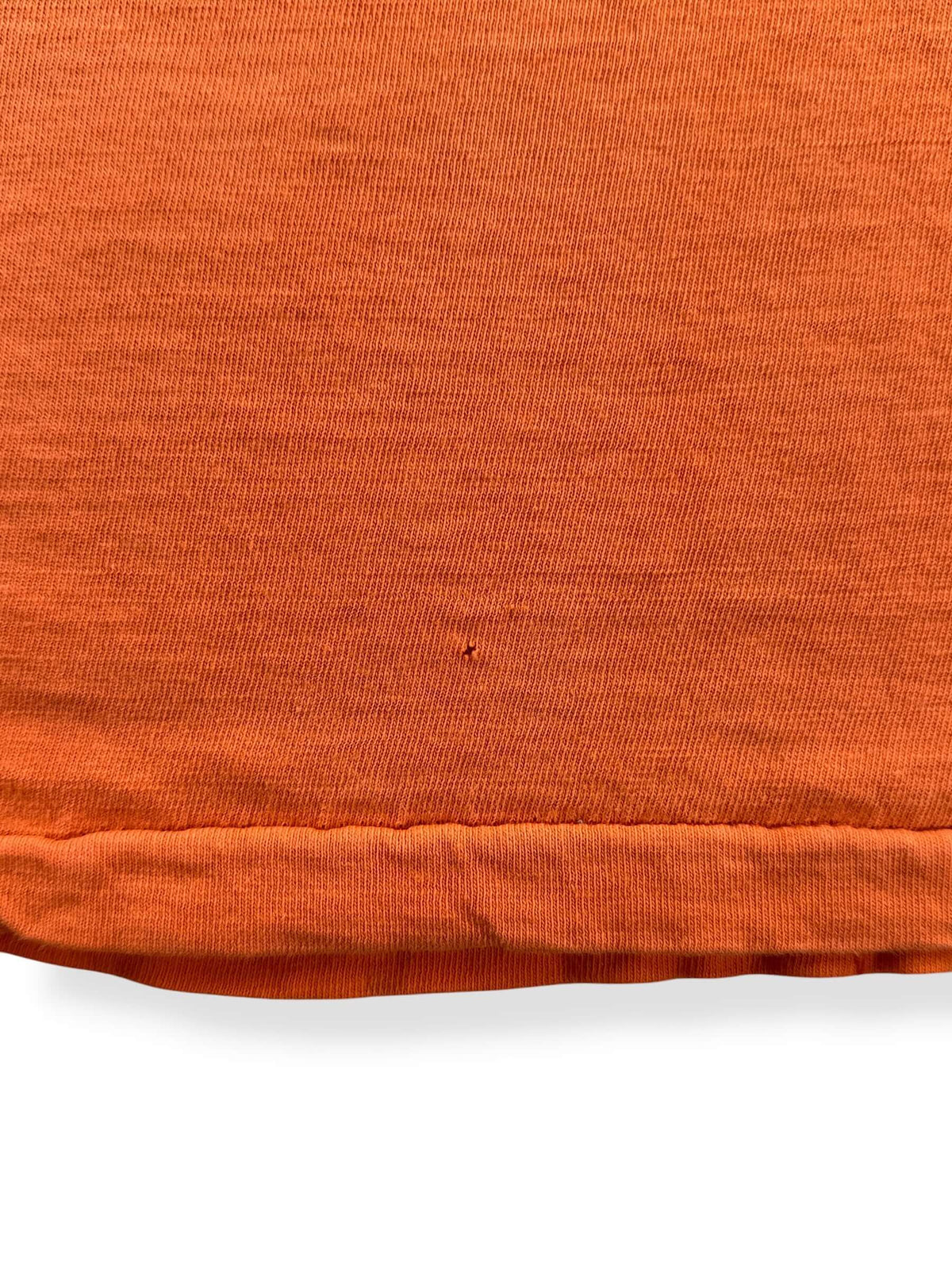 Small pinhole near bottom hem of Vintage 1960s Orange Cotton Pocket Tee SZ M
