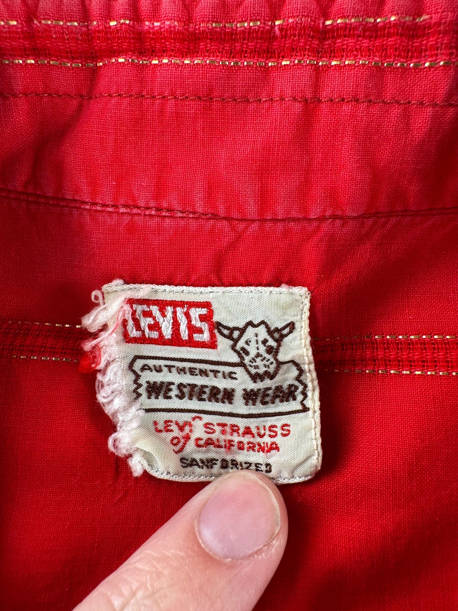 Label on Vintage Levi's Western Wear Red Pearlsnap SZ M
