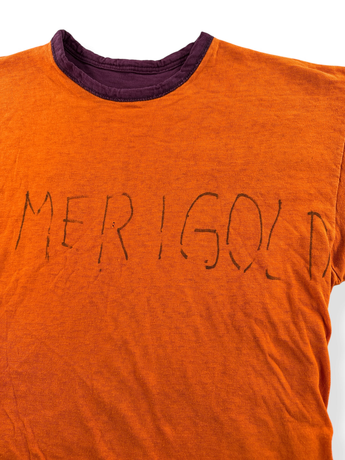 Merigold written on inside of Vintage Champion Blue Bar Burgundy Reversible Tee SZ M