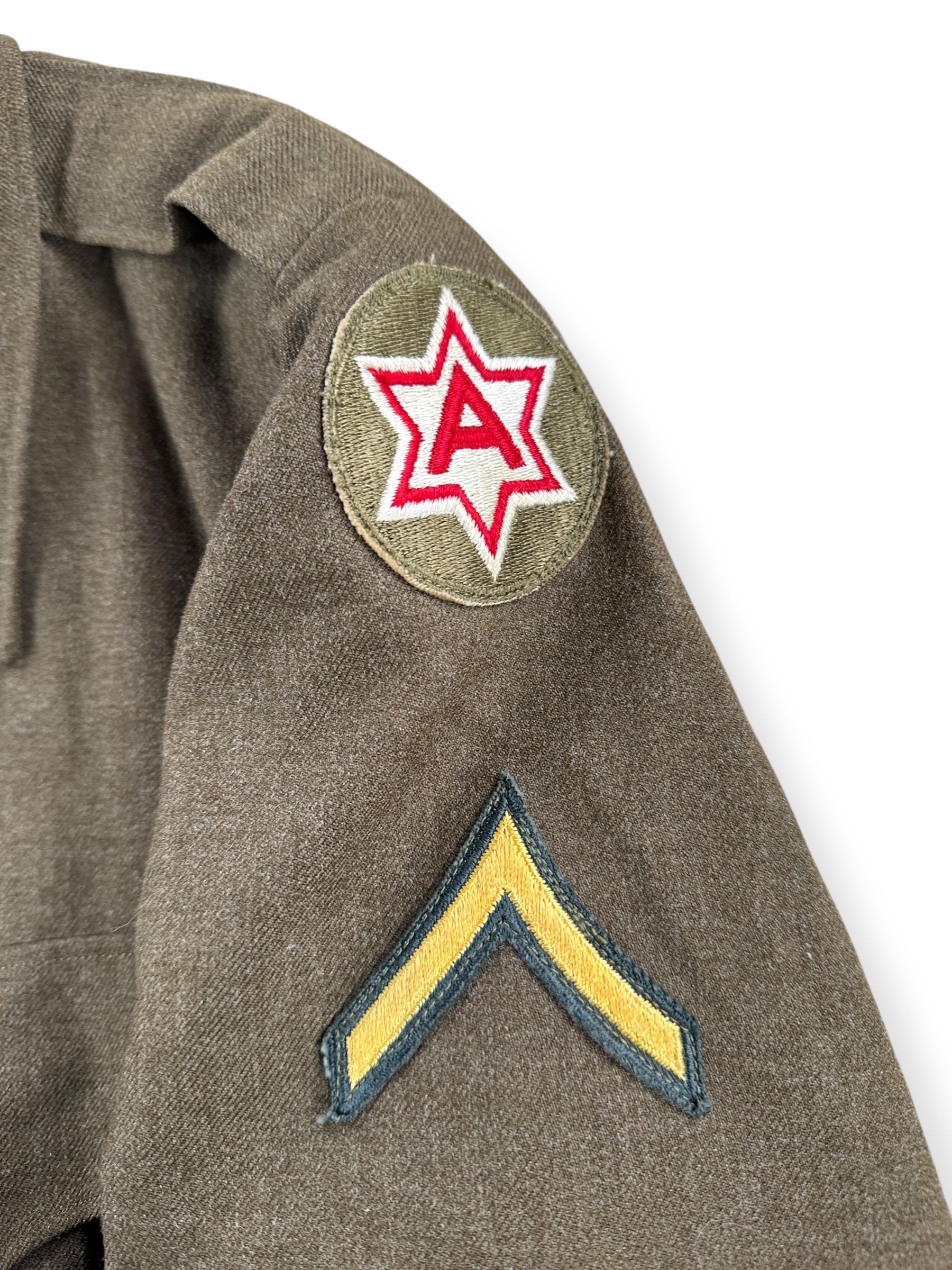 Military Patch on Vintage Eisenhower Military Jacket SZ XL