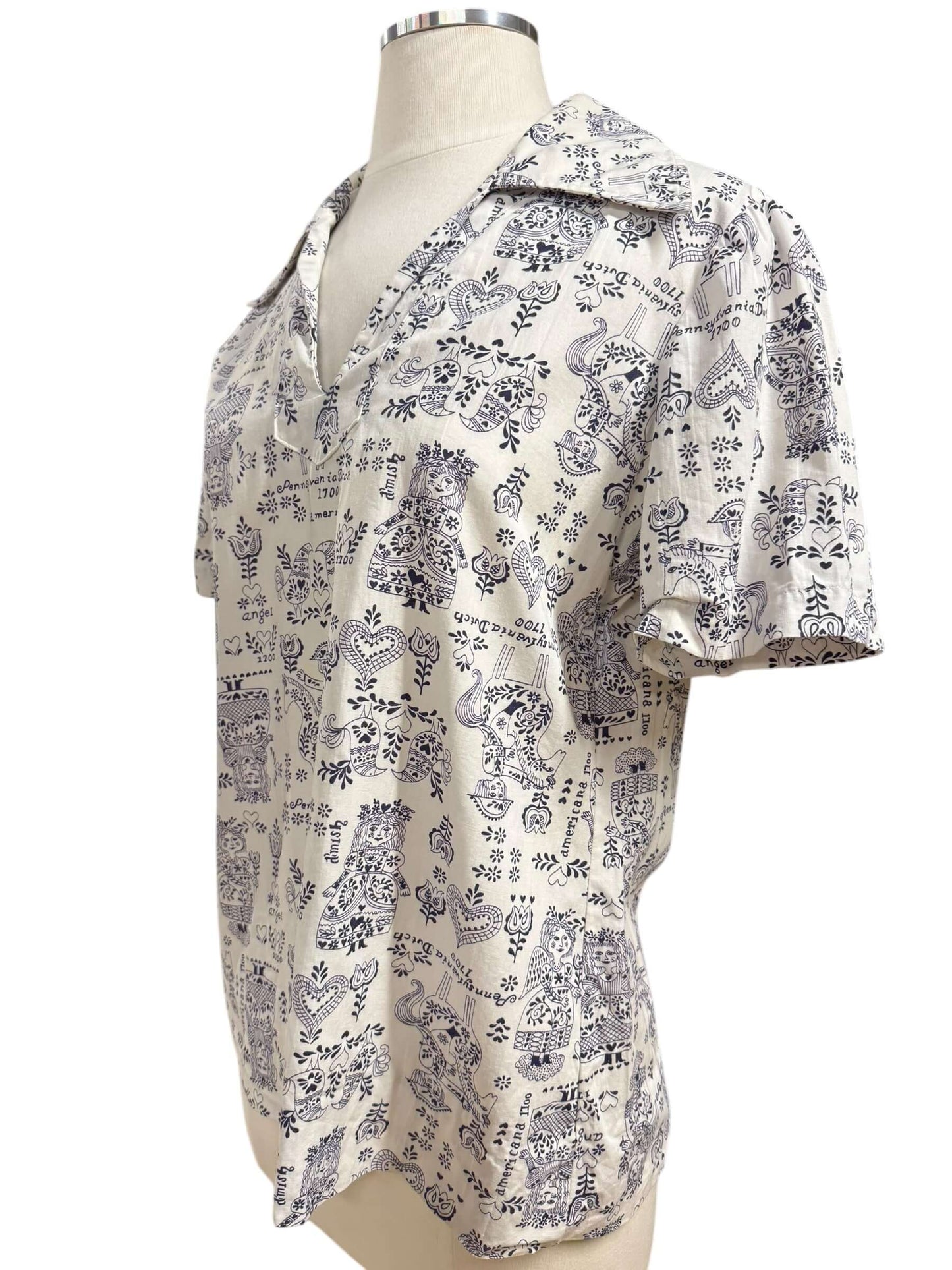 Side view of 1960s Pennsylvania Dutch Novelty Shirt L