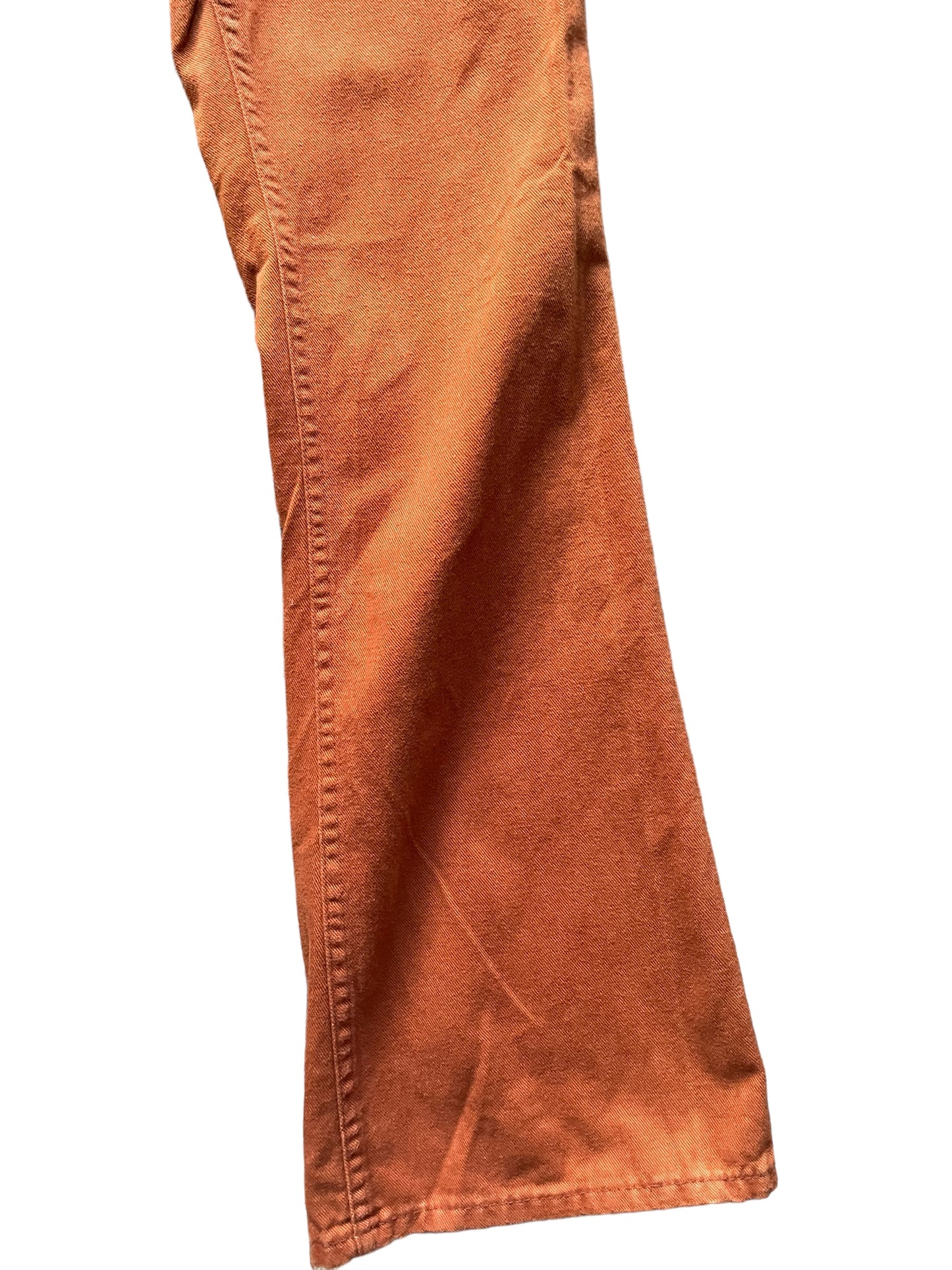 Front left leg view of Vintage 1970s Rusty Orange Bells W30 | Barn Owl Vintage Seattle | Vintage Pants and Denim