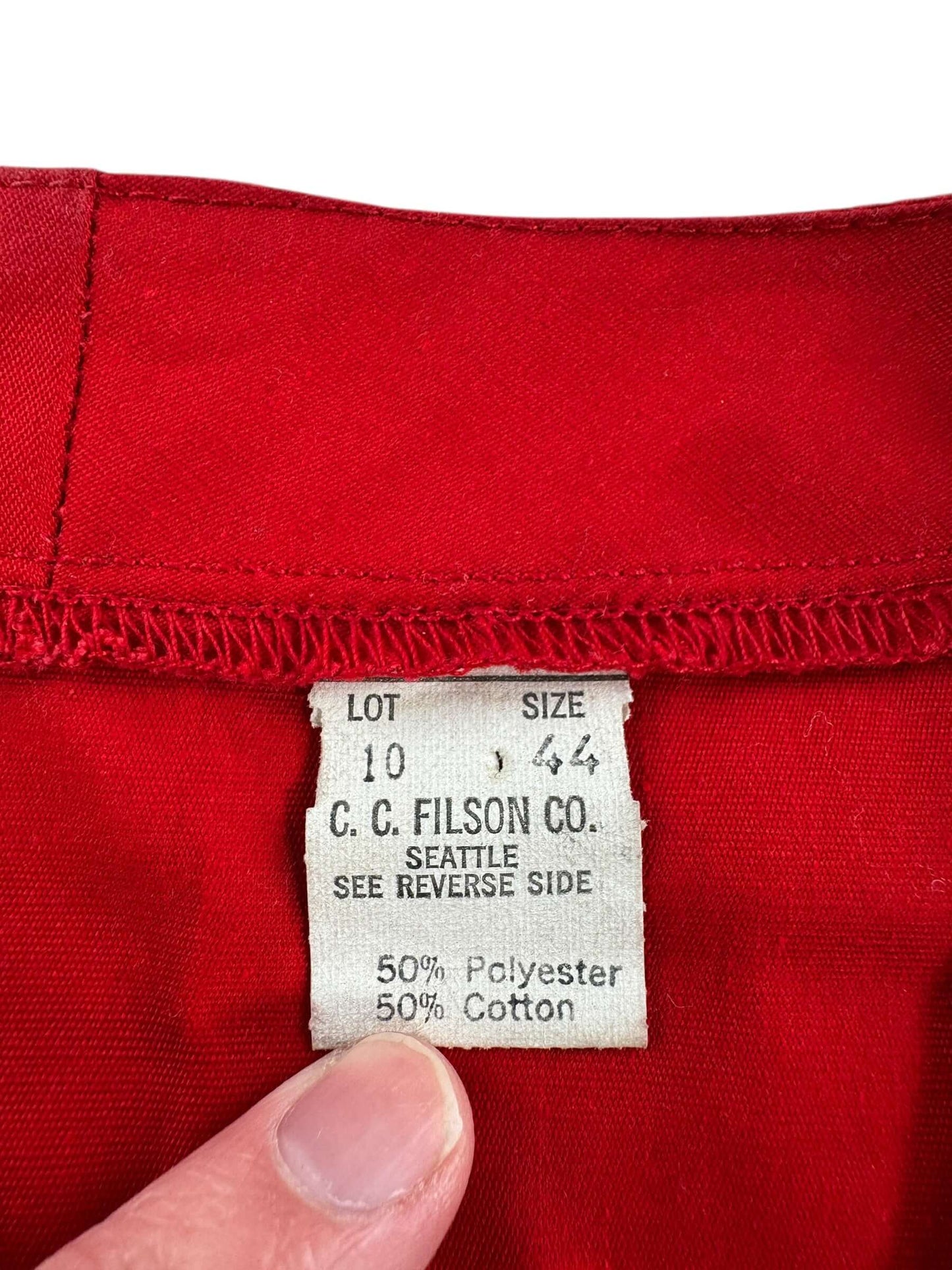Tag on Vintage Red Filson Hunting Vest SZ 44