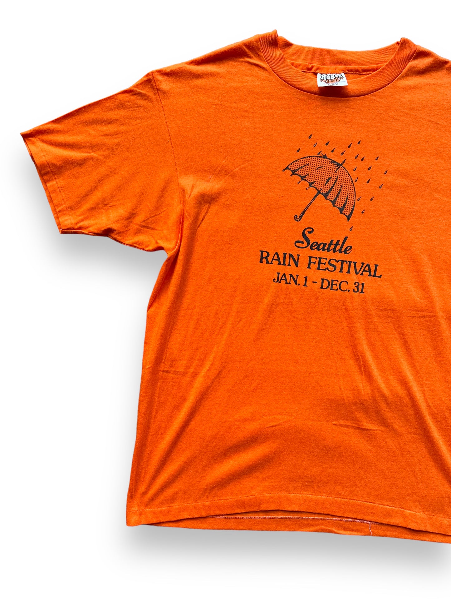 Front Right View of Vintage Orange Seattle Rain Festival Tee SZ XL | Vintage Seattle Tourist Tees | Barn Owl Vintage Tees Seattle