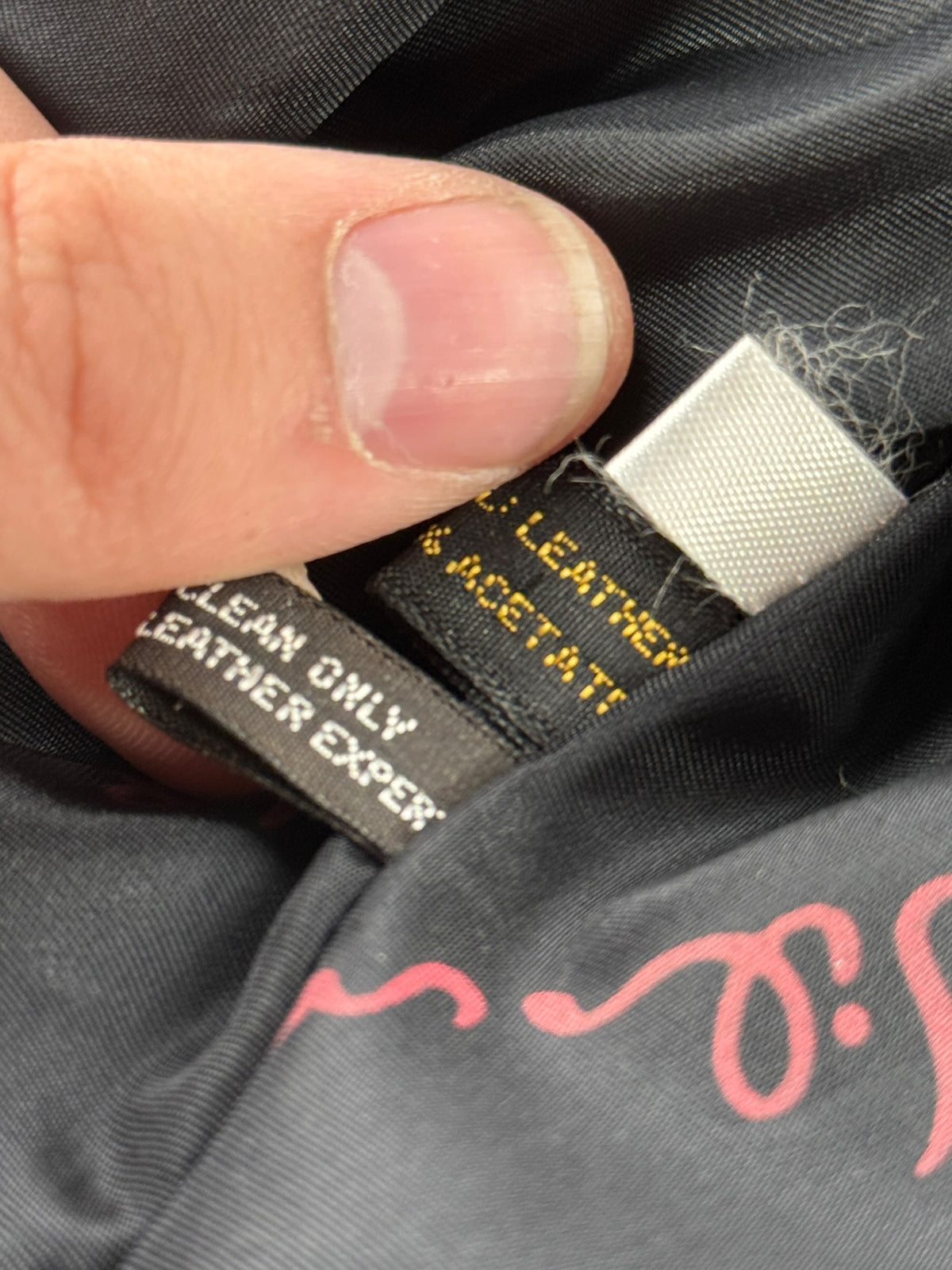 Back of inner tags on Vintage Wilson's Leather Jacket SZ 10