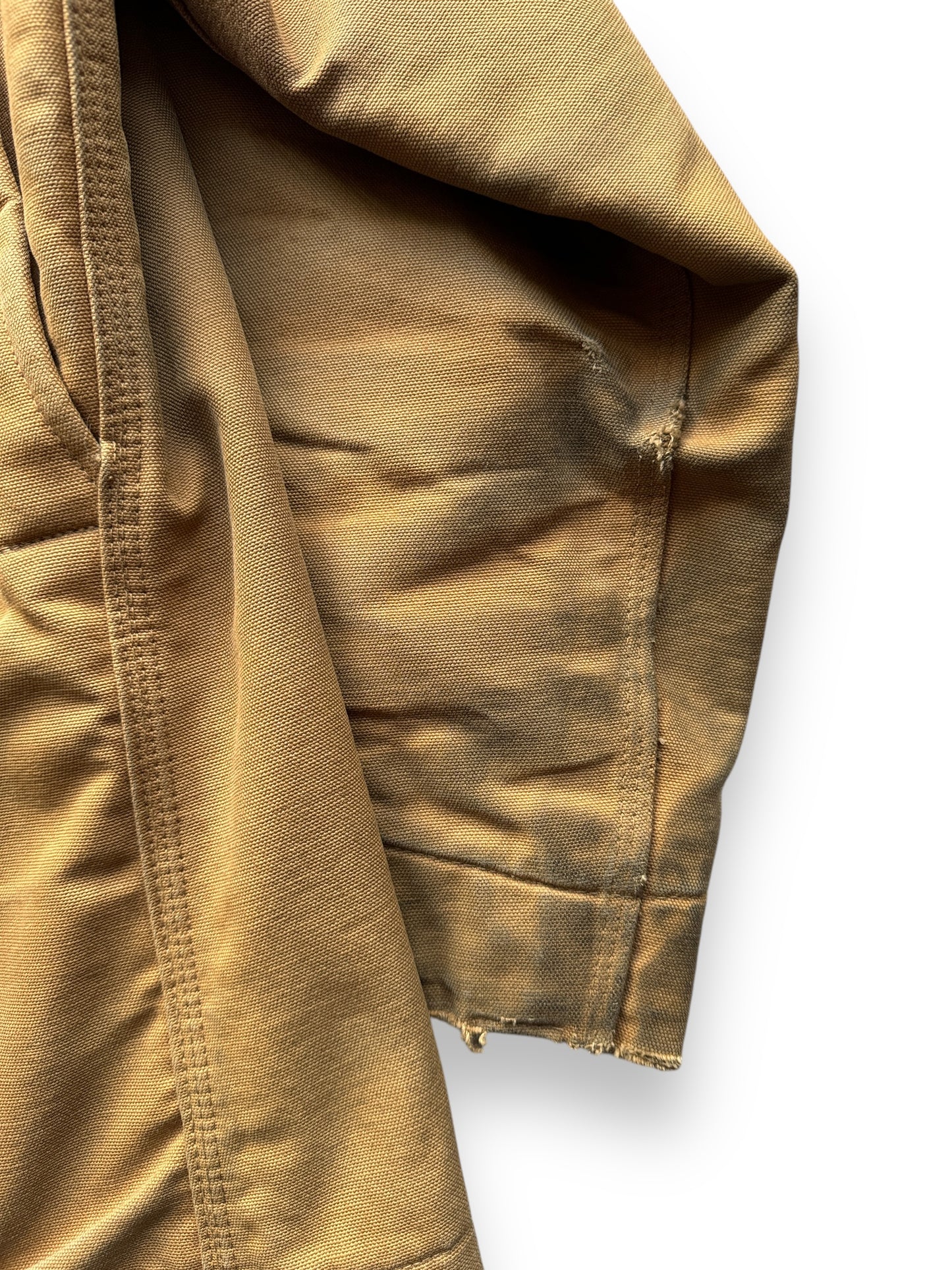 oil stains on right sleeve of Vintage 70's Carhartt Chore Jacket SZ 44