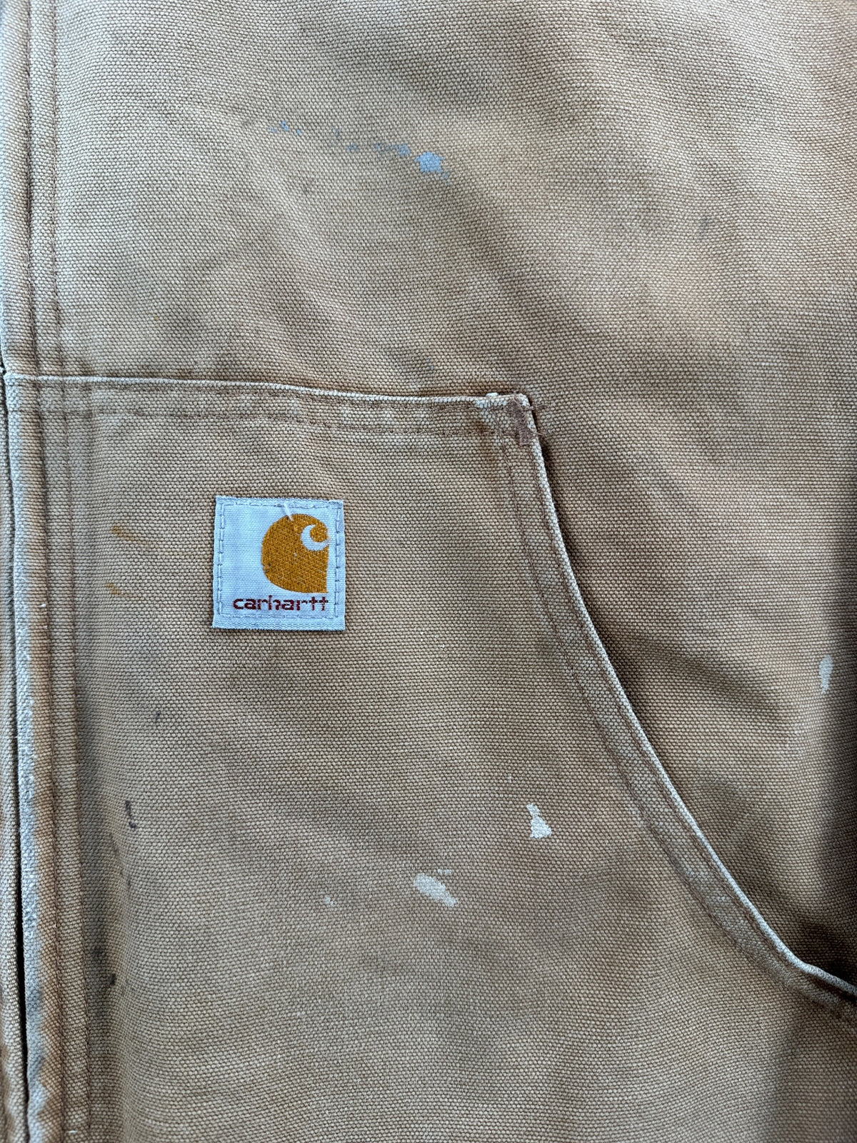 Tag on front of Carhartt Tan Hooded Jacket SZ L