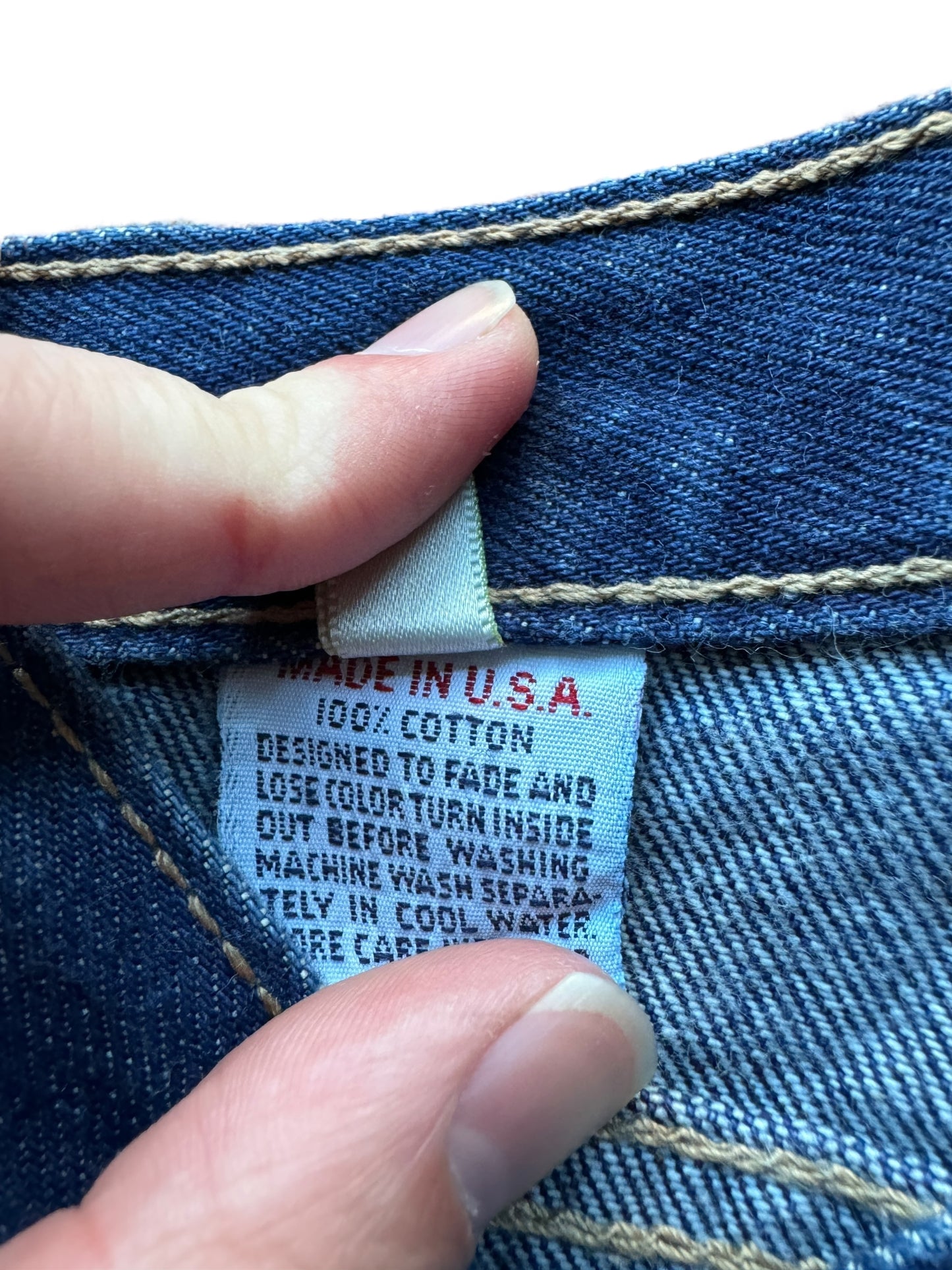 Tag on Vintage USA Made Calvin Klein Jeans W28