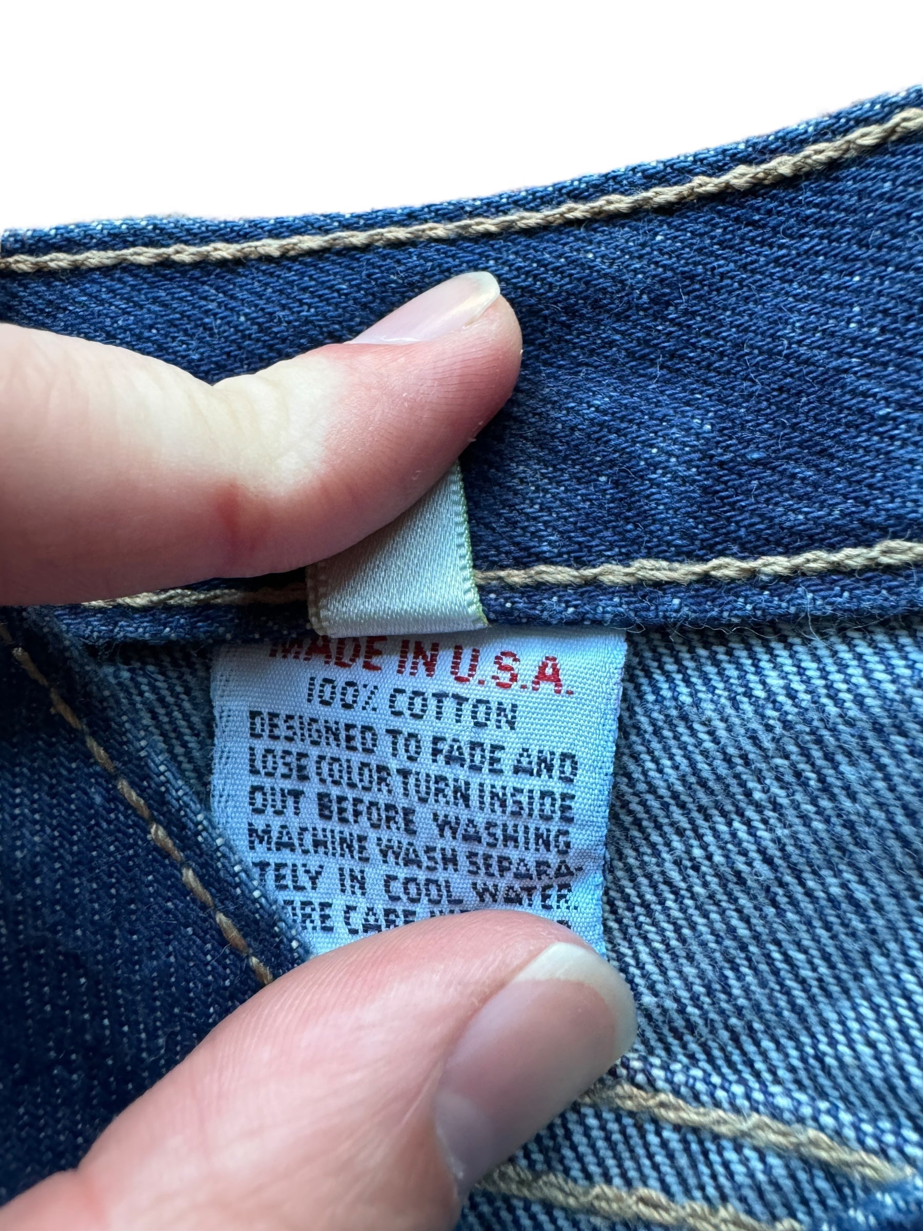 Tag on Vintage USA Made Calvin Klein Jeans W28
