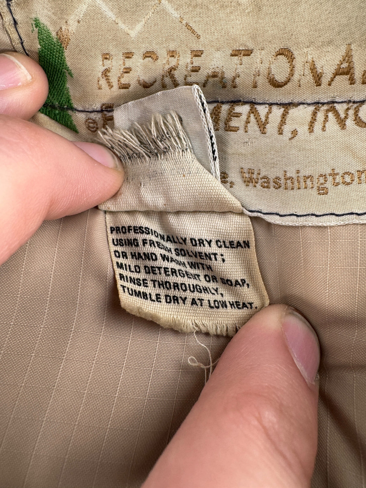 Tags on Vintage 80’s REI Down Jacket SZ L