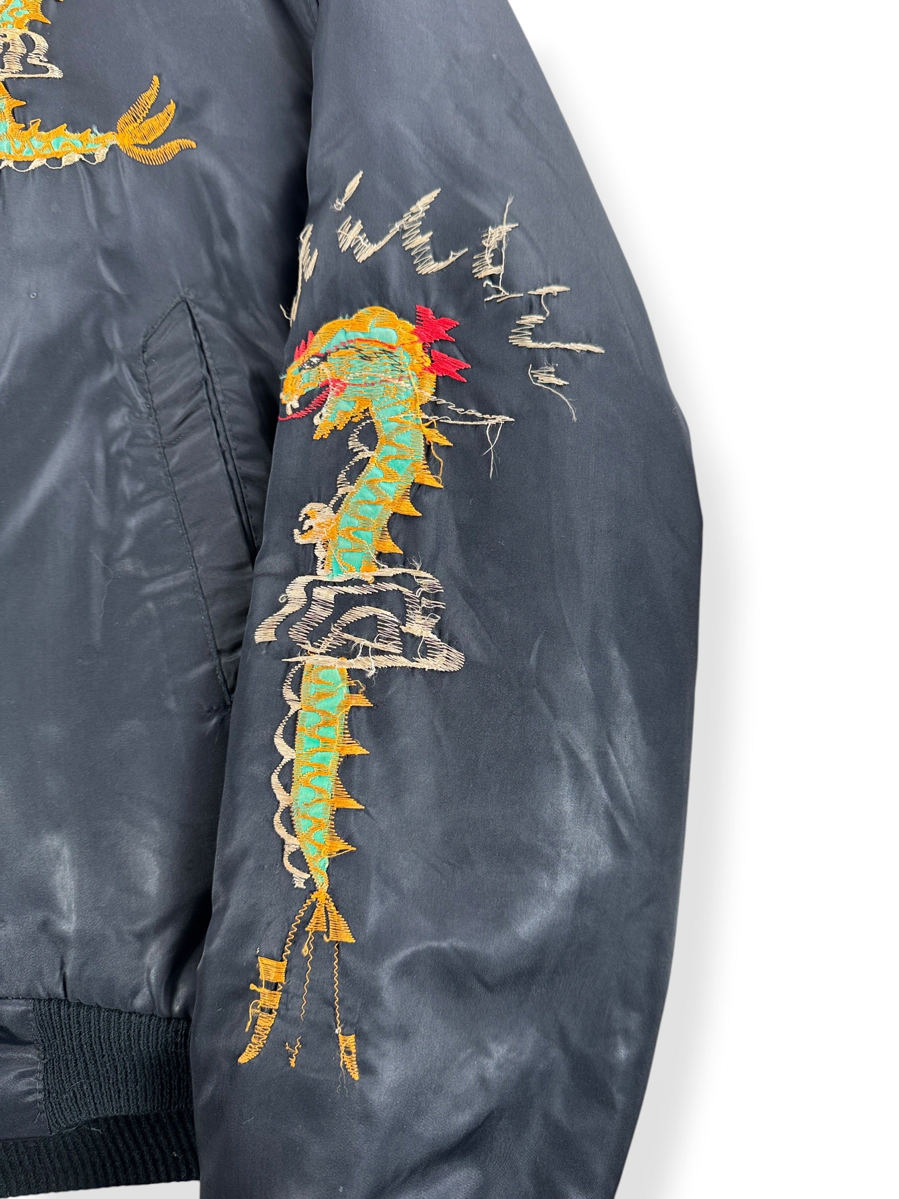 Close-up of embroidery on left arm of Vintage '78 Korea 'Troy' Souvenir Jacket SZ L - AS IS
