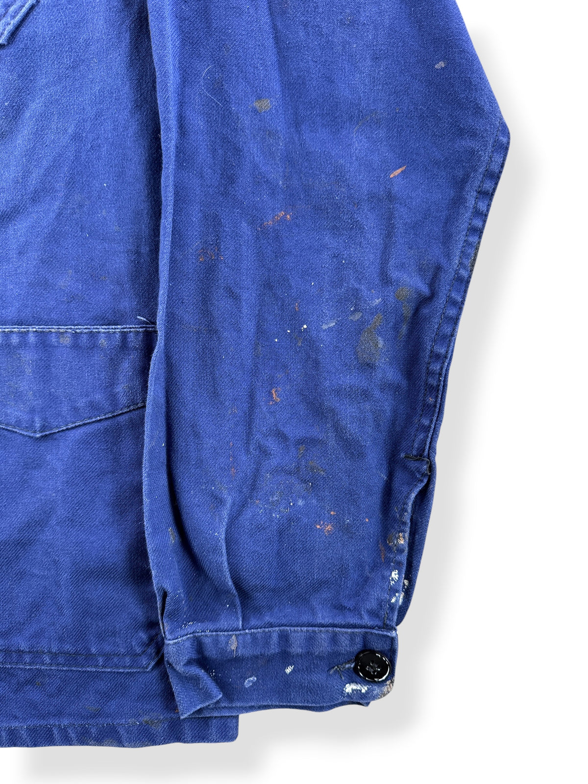 Paint on sleeve of Vintage Paint Splattered French Chore Coat SZ M