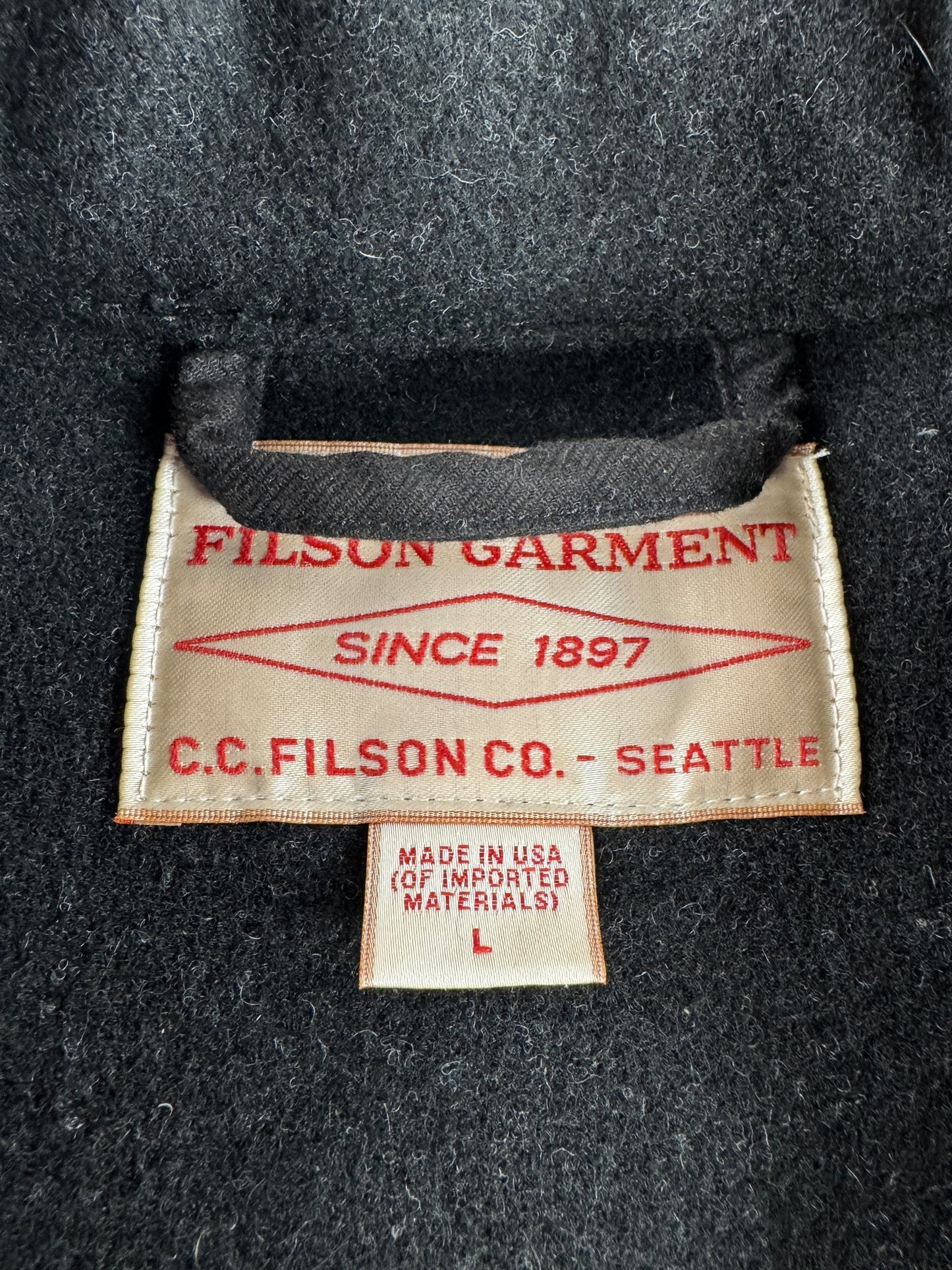 Label on Filson Charcoal Mackinaw Wool Cruiser SZ L