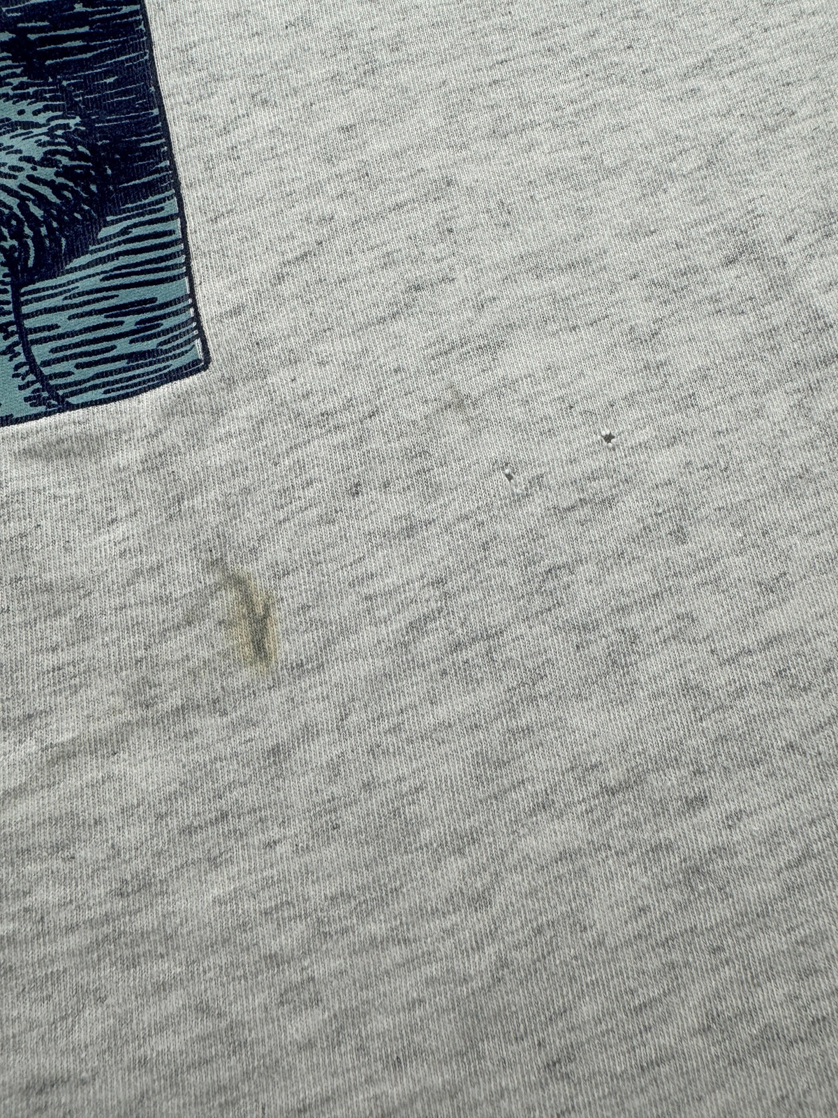 Small stains and small holes on front of Vintage Built to Spill Picasso Tee SZ XL AS IS
