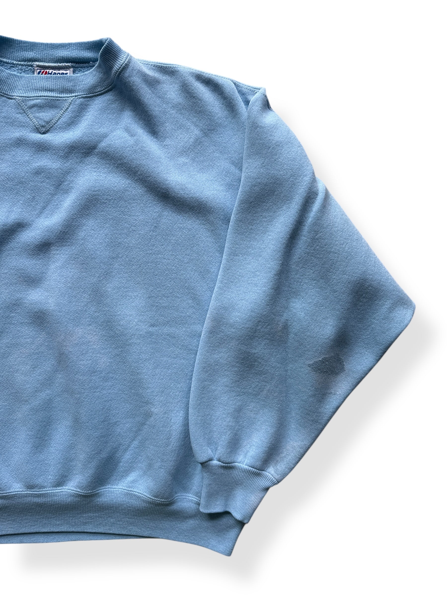 Front Left of Vintage Hanes Powder Blue Crewneck SZ XL