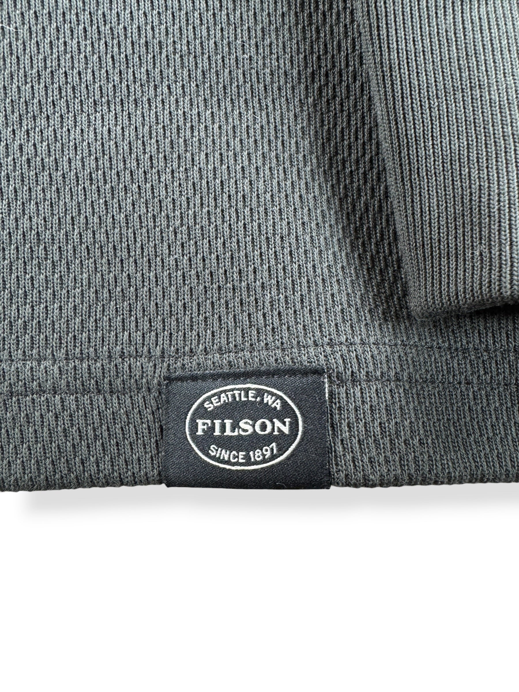 Label on Filson Faded Black Waffle Knit Henley SZ L