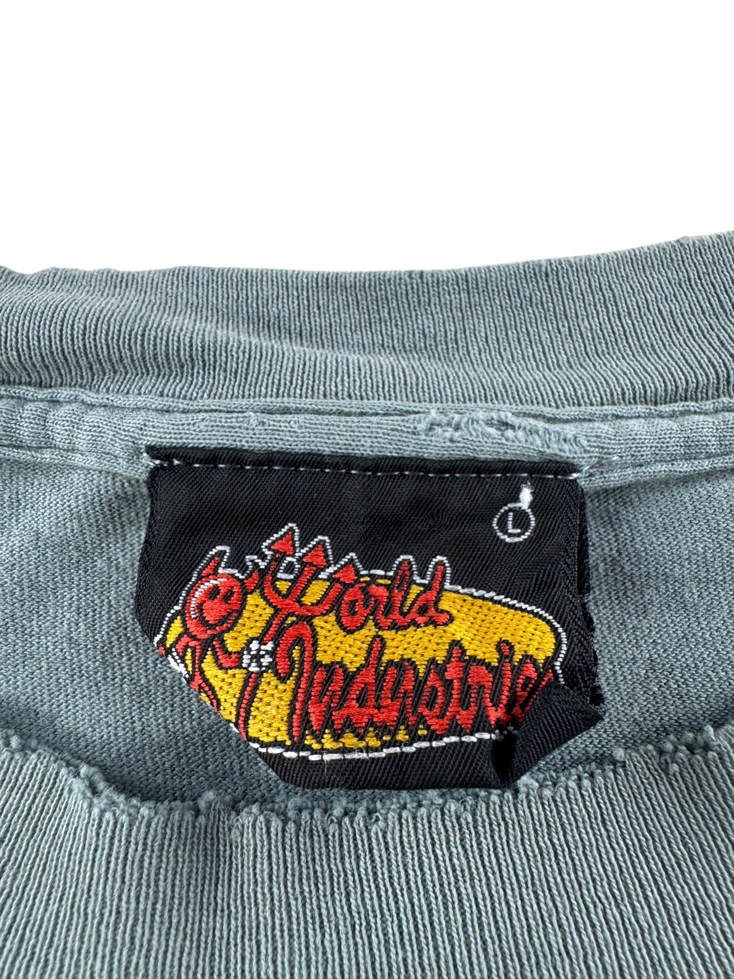 Tag on Vintage World Industries Flame Boy Tee SZ L
