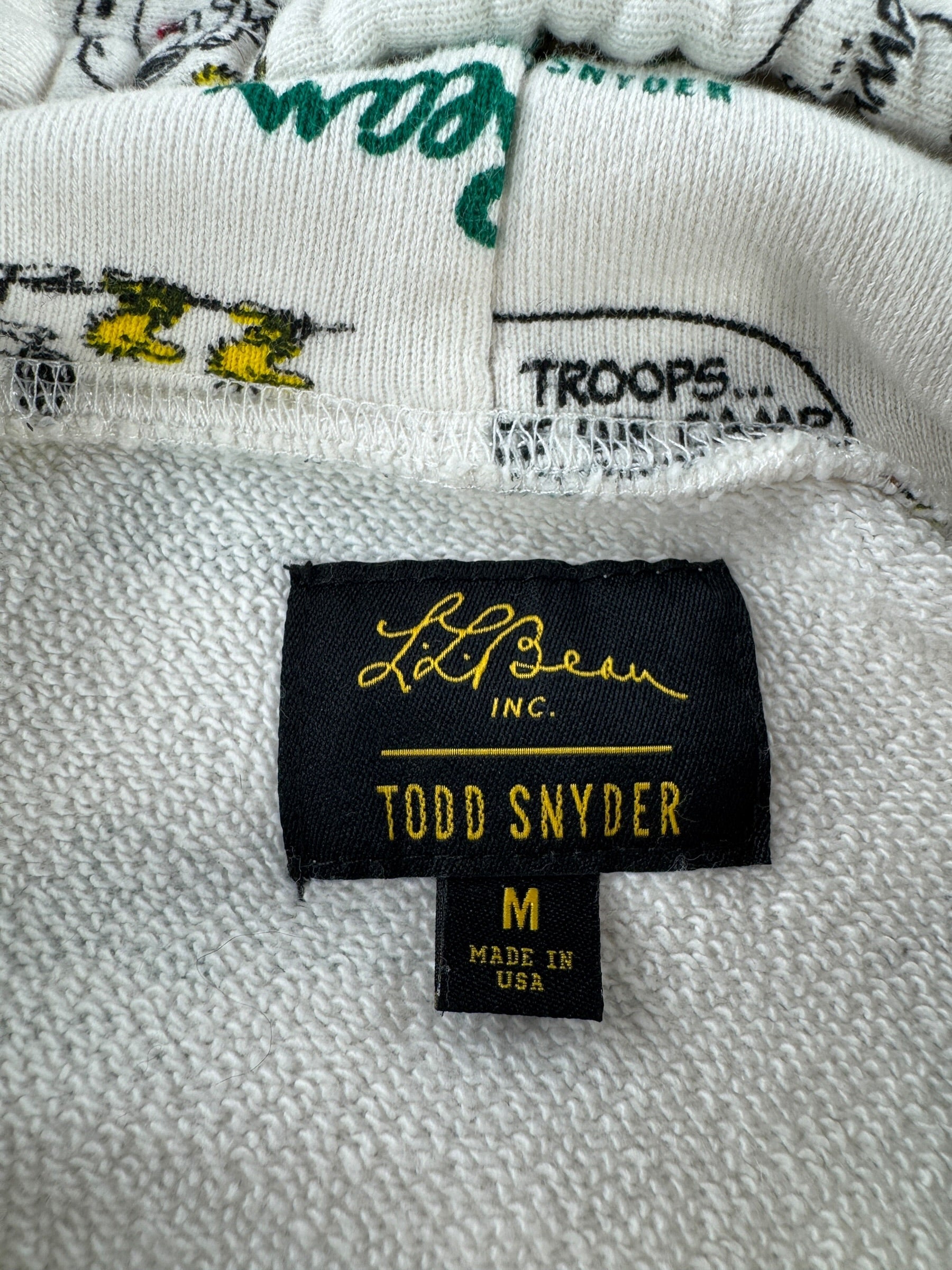 Label on Repro LL Bean x Todd Snyder All Over Print Snoopy Hoodie SZ M