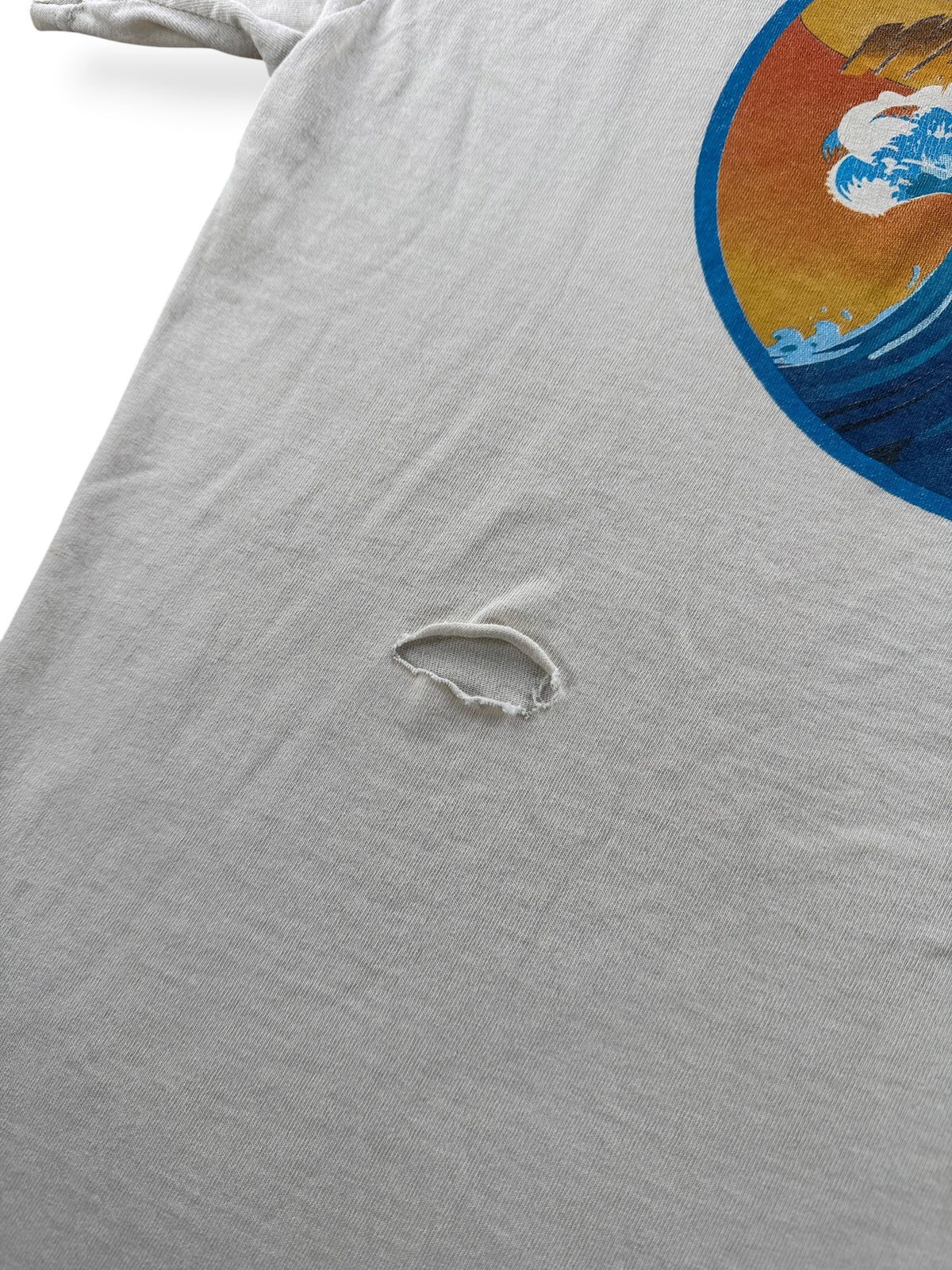 Hole on back of Vintage Distressed Myer's Rum Tee SZ L