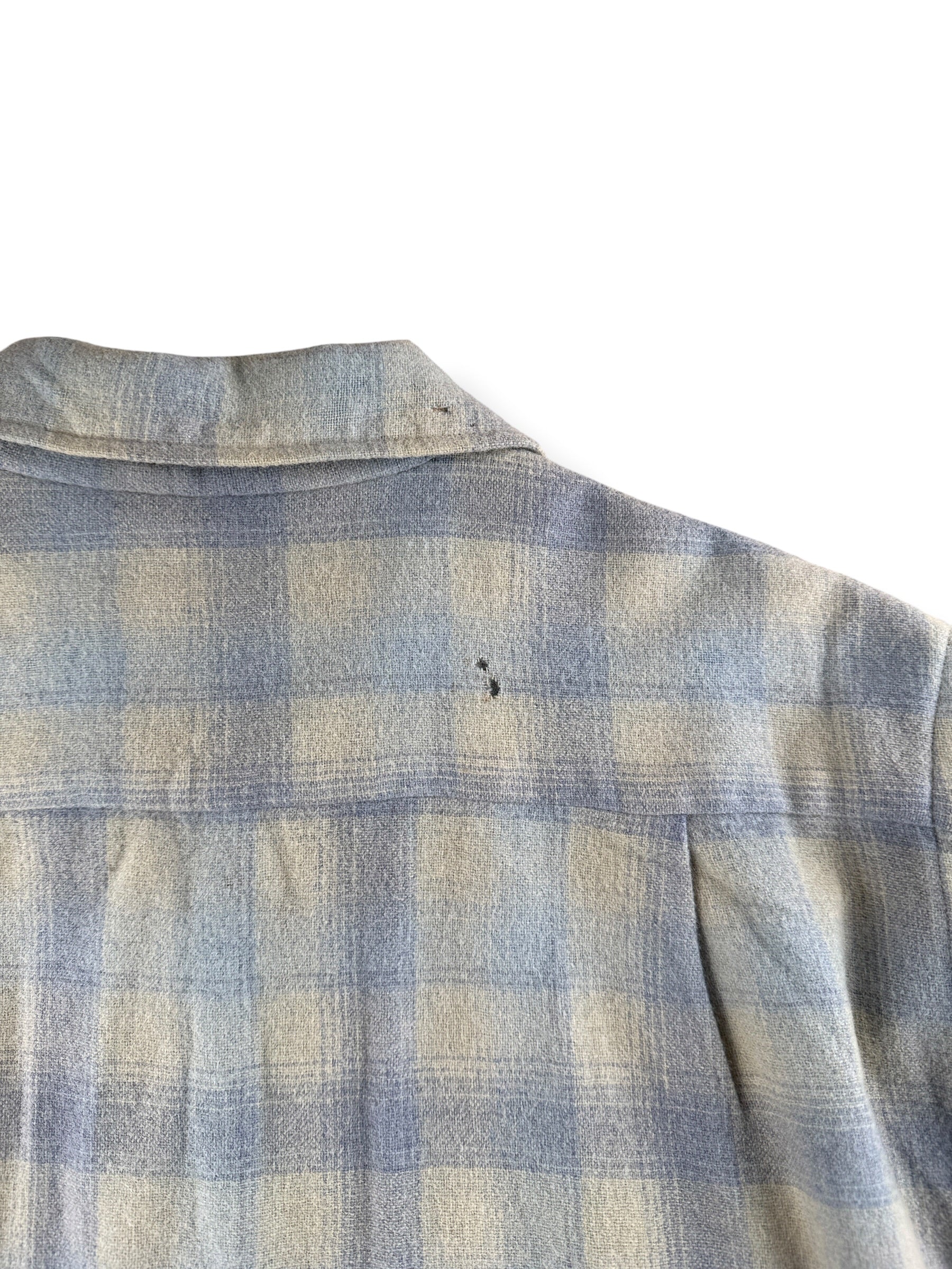 Small holes on back shoulder of Vintage Highlander Woolen Mills Blue Plaid Flannel SZ L - AS IS