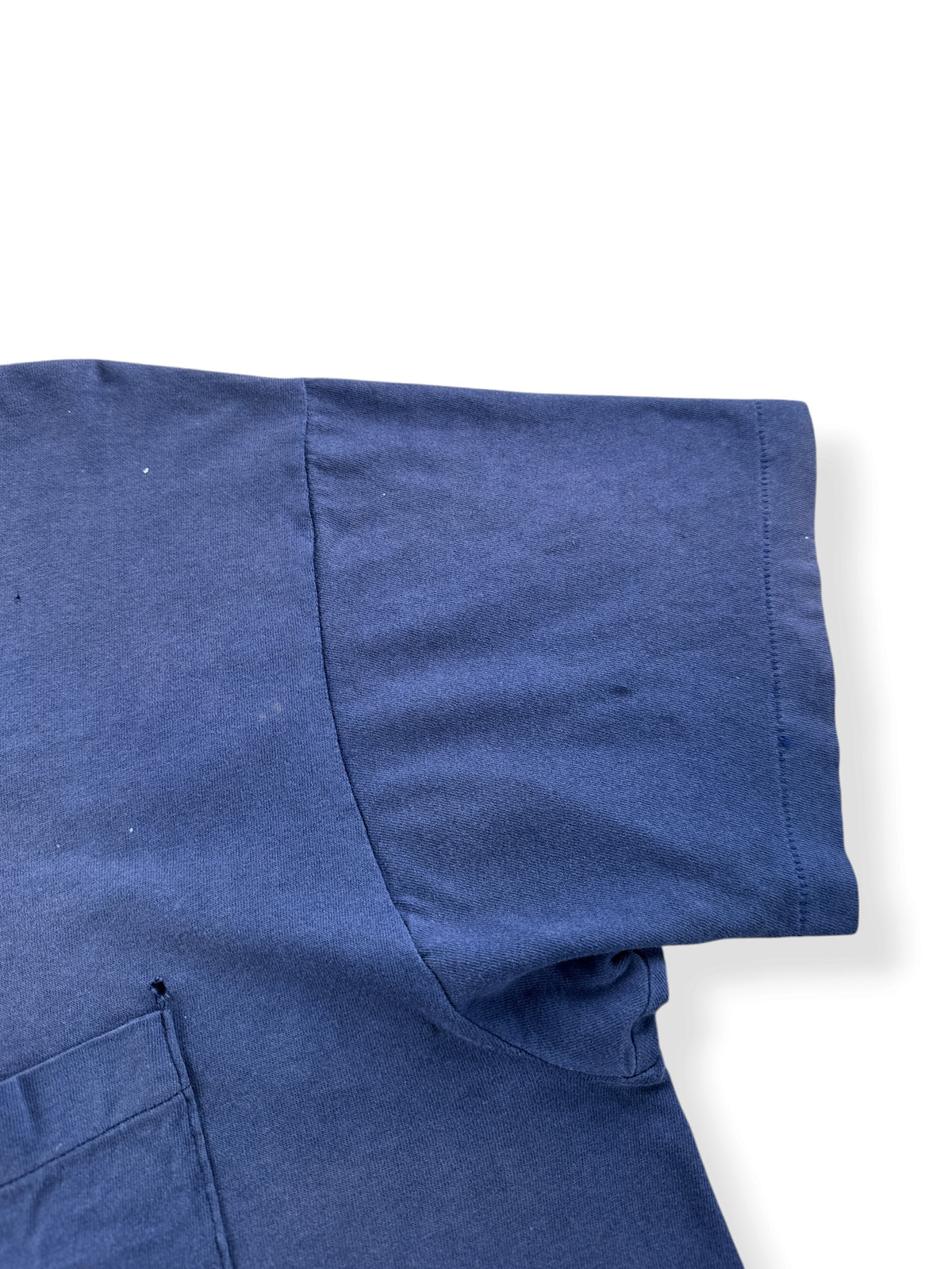 Wear on sleeve of Vintage Distressed Navy Blue Pocket Tee SZ L