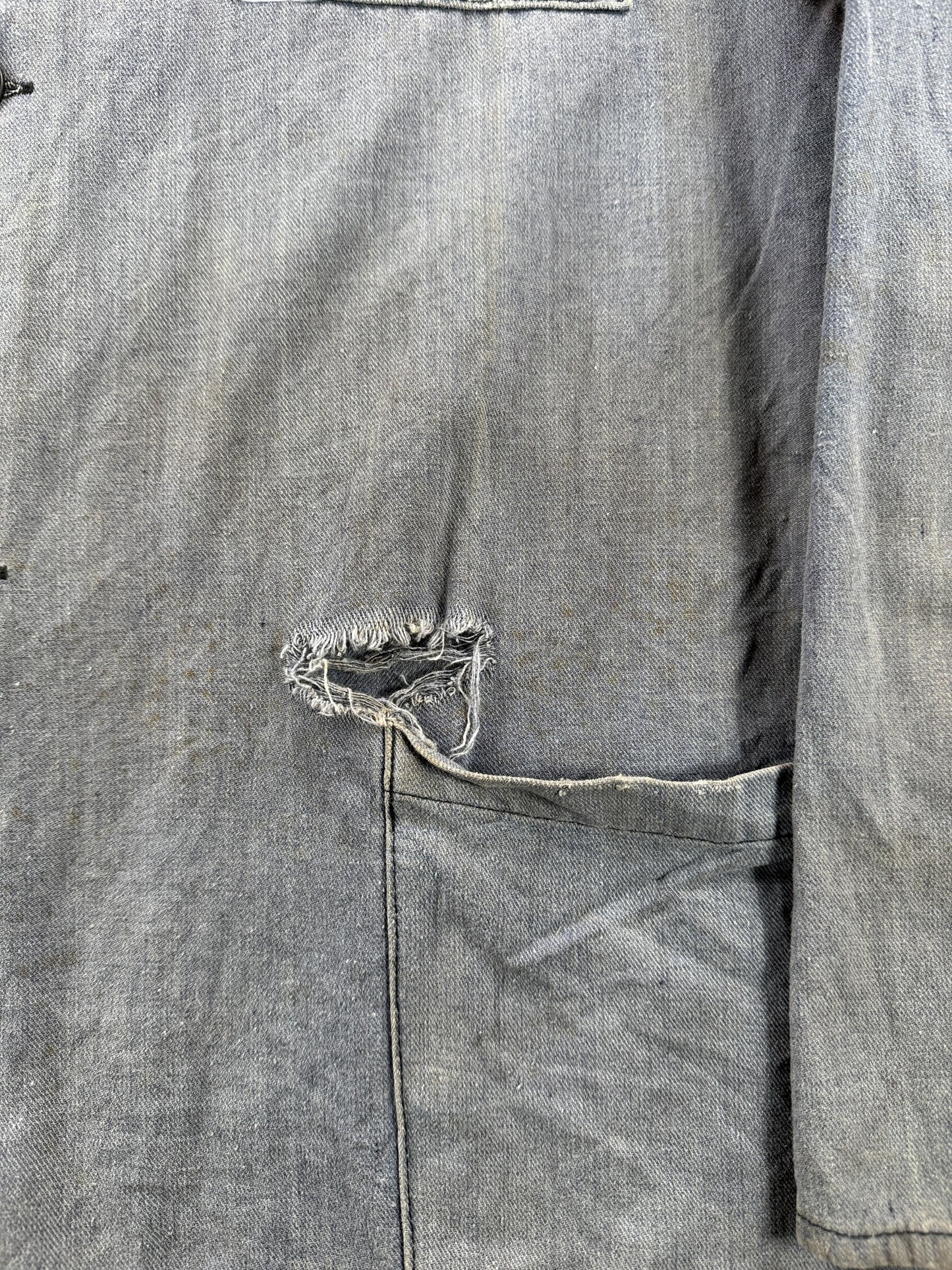 Tear on Vintage Faded And Distressed French Chore Coat SZ L
