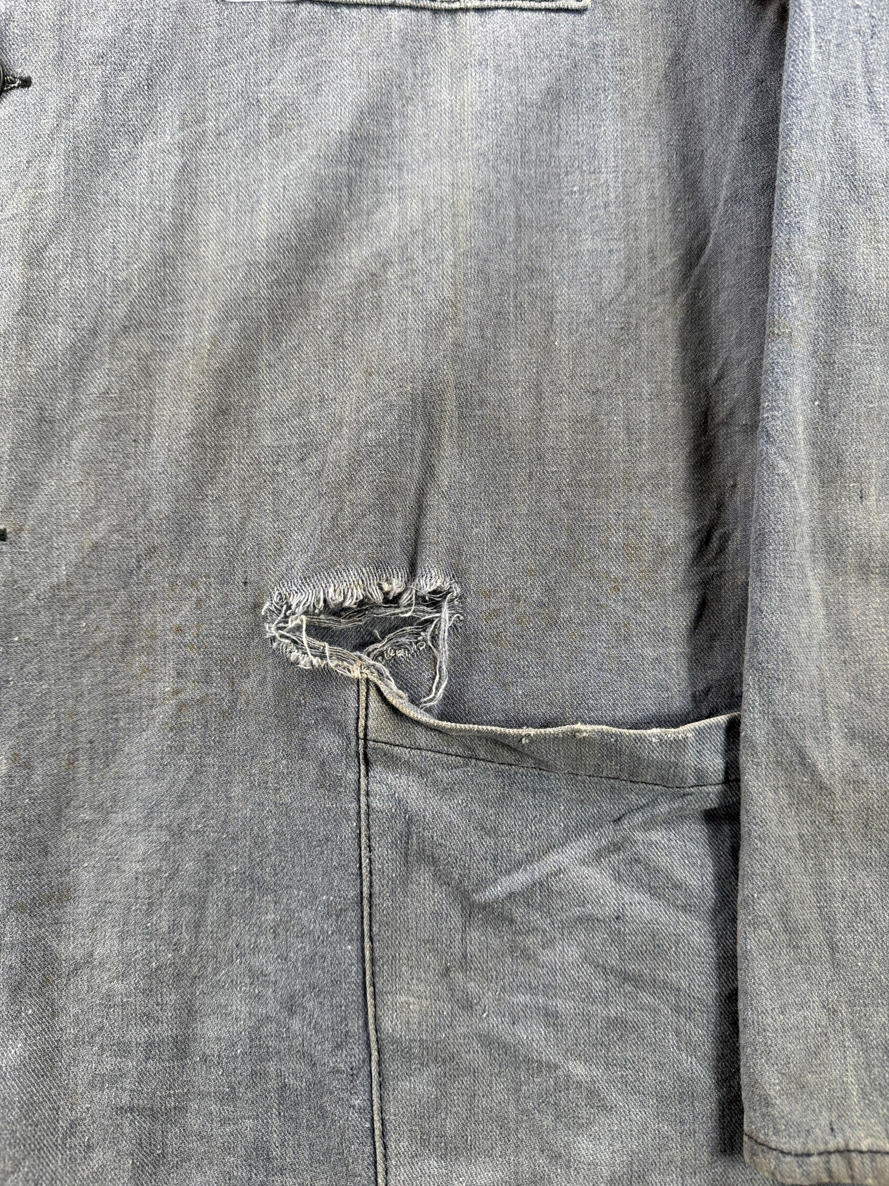 Tear on Vintage Faded And Distressed French Chore Coat SZ L