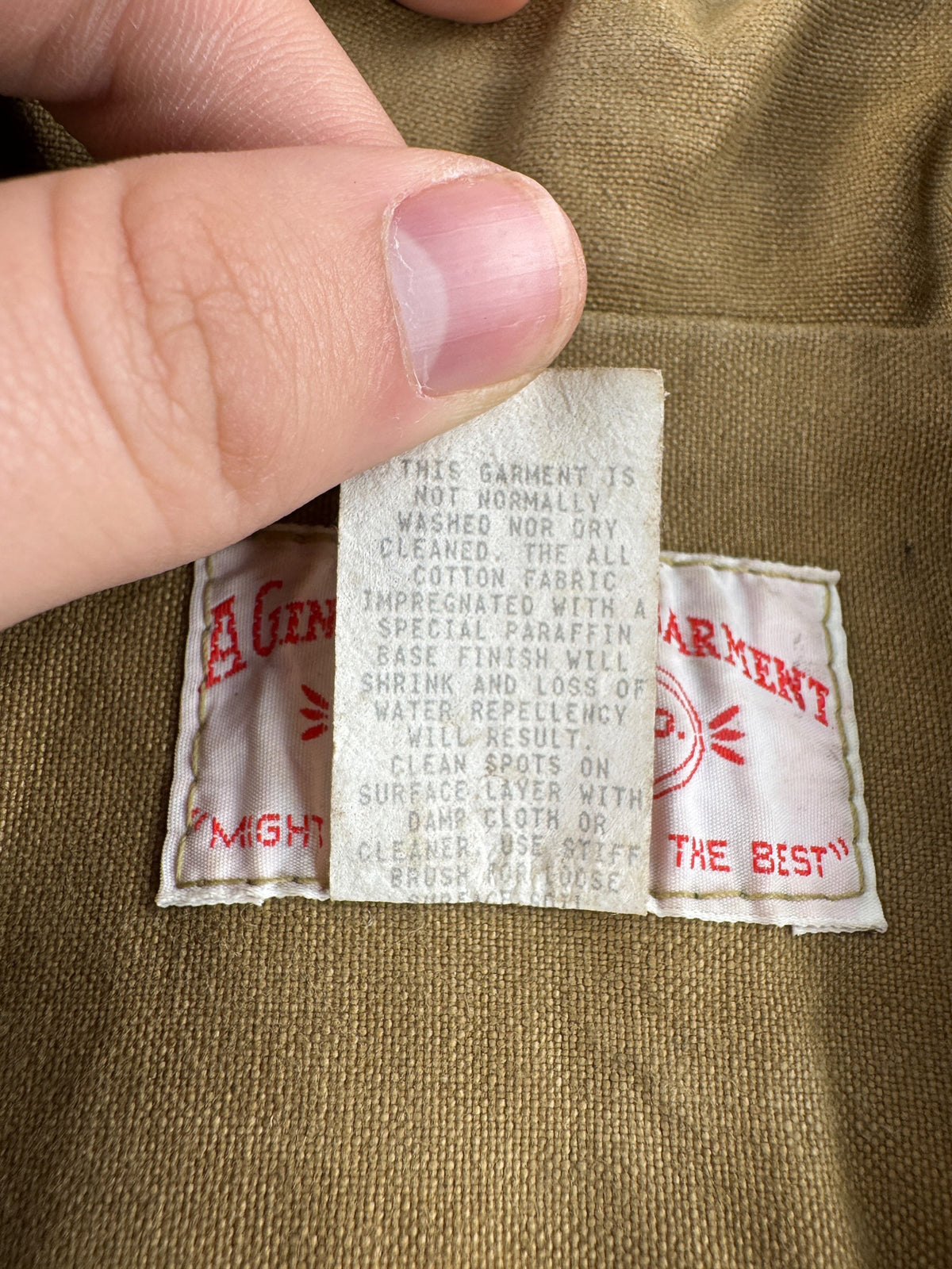 Care tag on Vintage Filson Double Tin Jacket SZ L