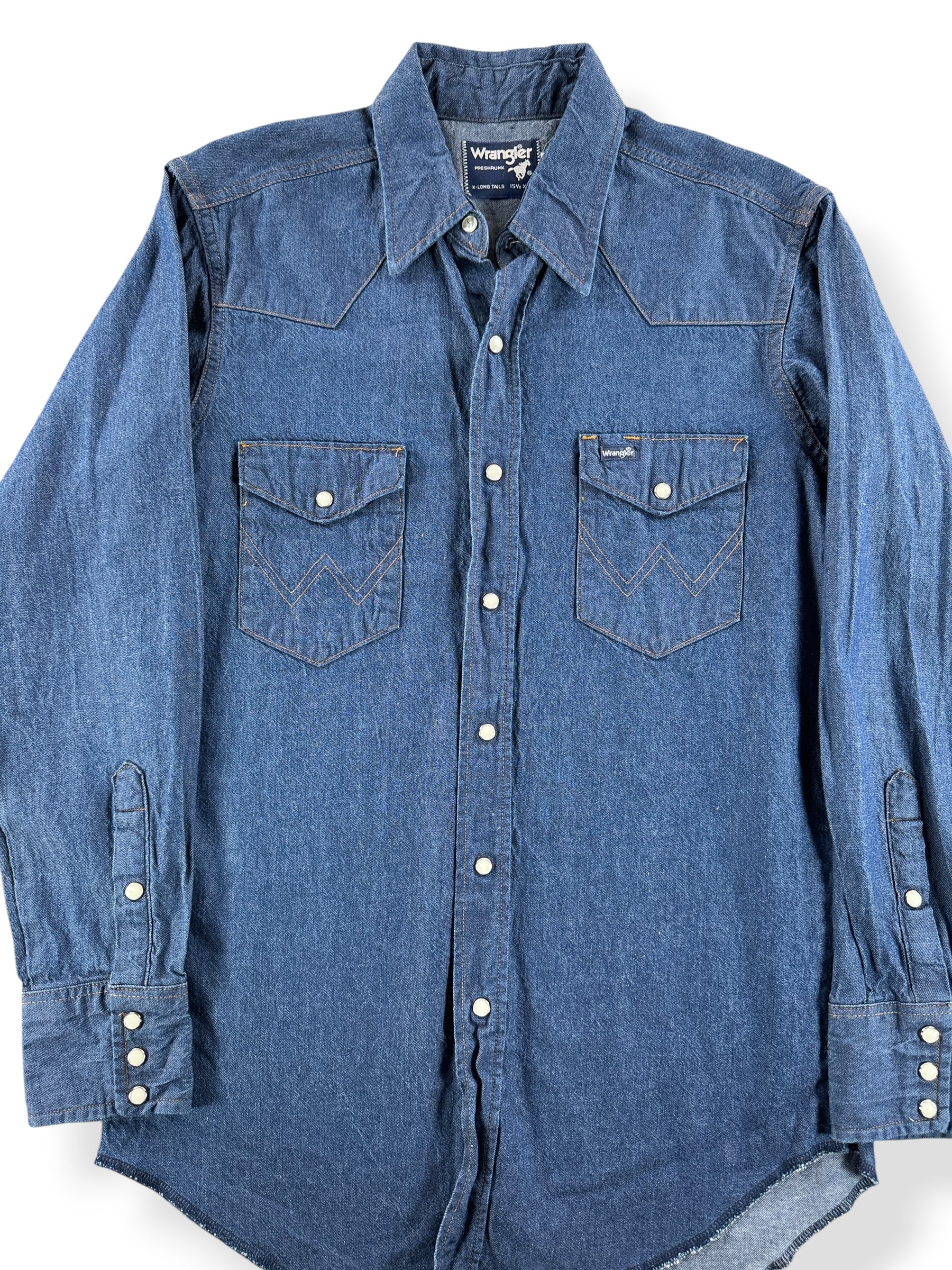 Front Close Up of Vintage Dark Wrangler Denim Pearl Snap SZ M