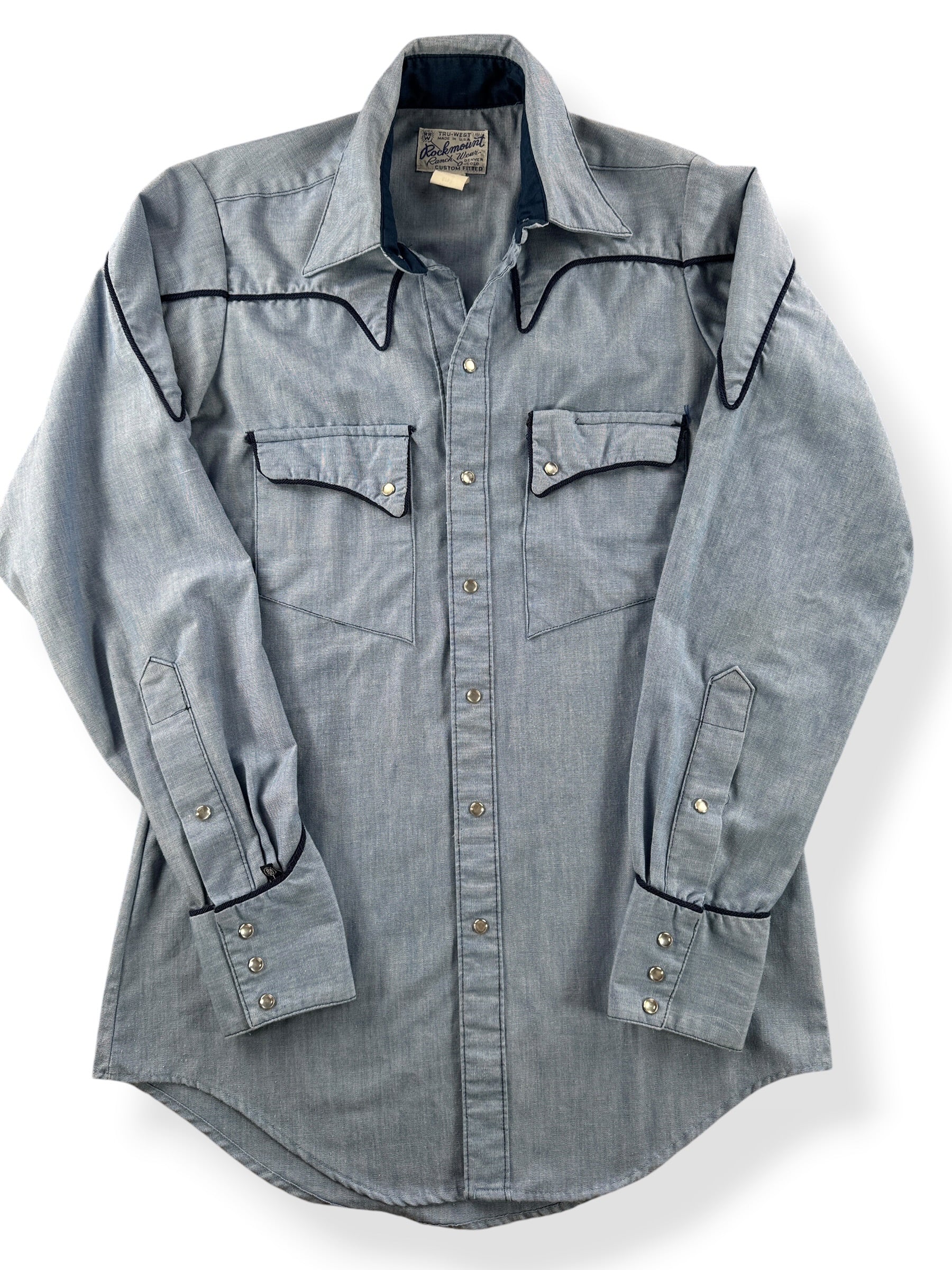 Close-up of Vintage Rockmount Ranch Wear Pearl Snap Chambray SZ 14 1/2
