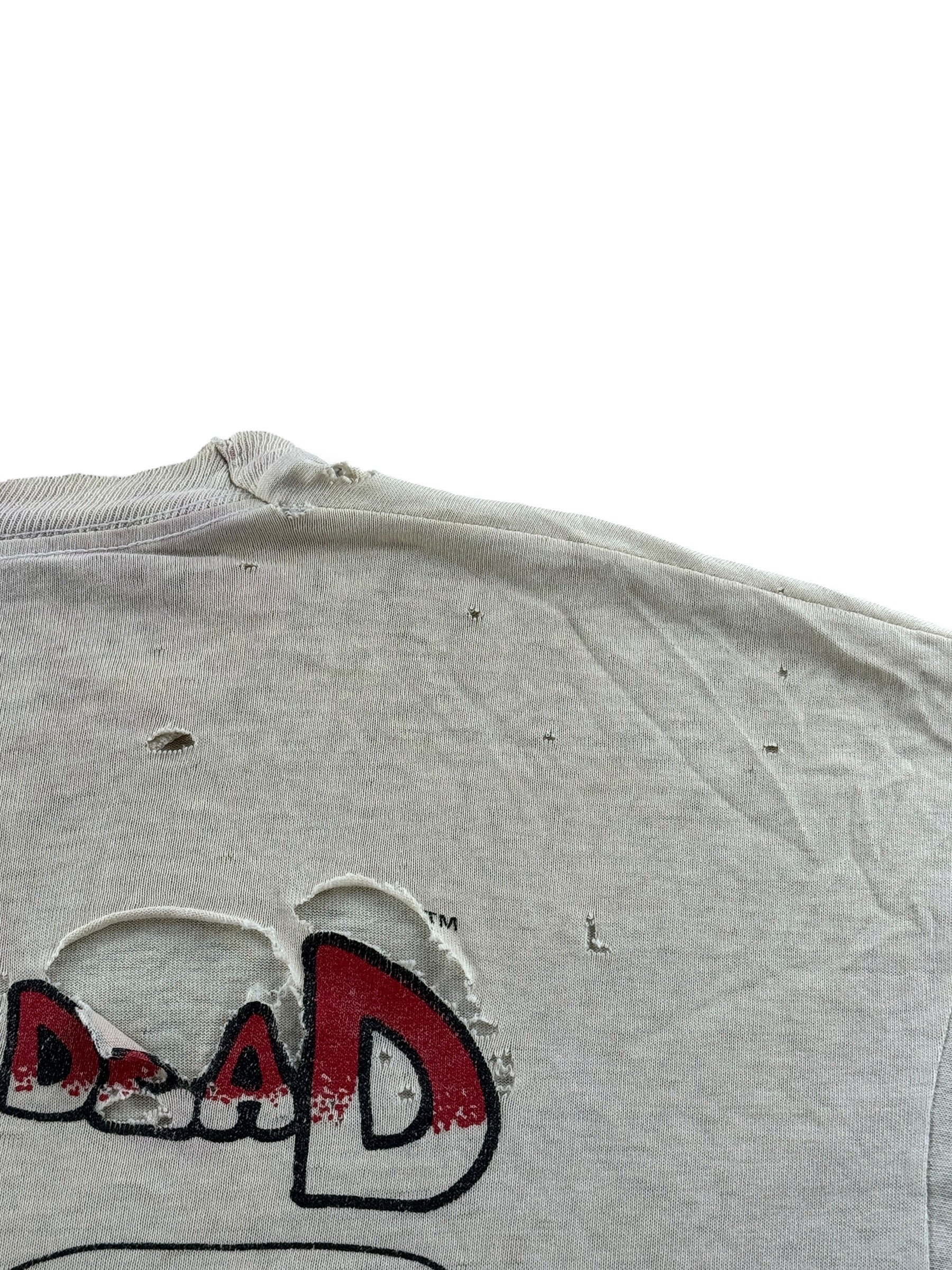 Damage on back of Vintage '90 Spring Tour Grateful Dead Bart Simpson Thrasher Tee SZ XL