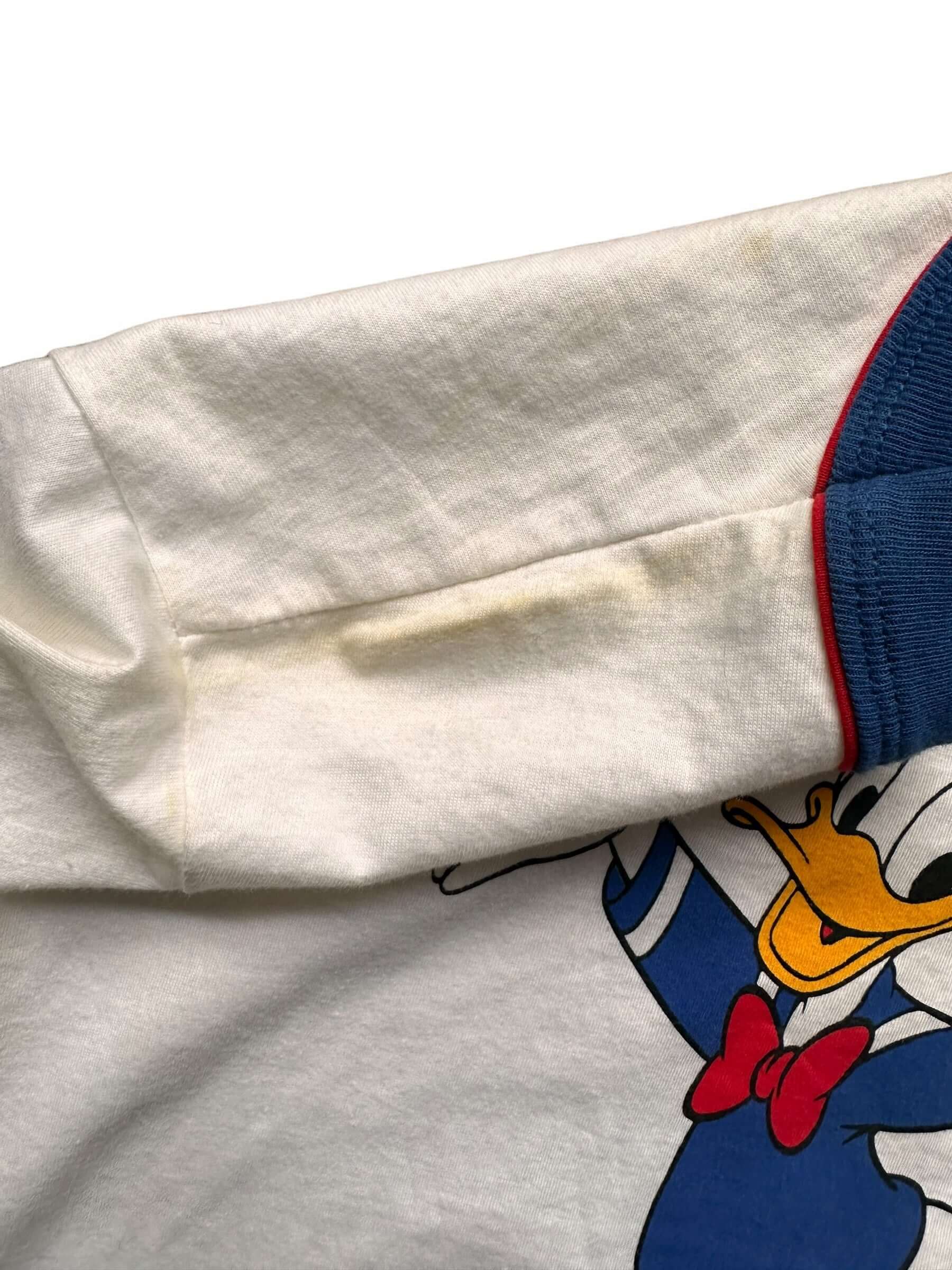 storage staining on shoulder of Vintage Donald Duck Disney Ringer Tee SZ S