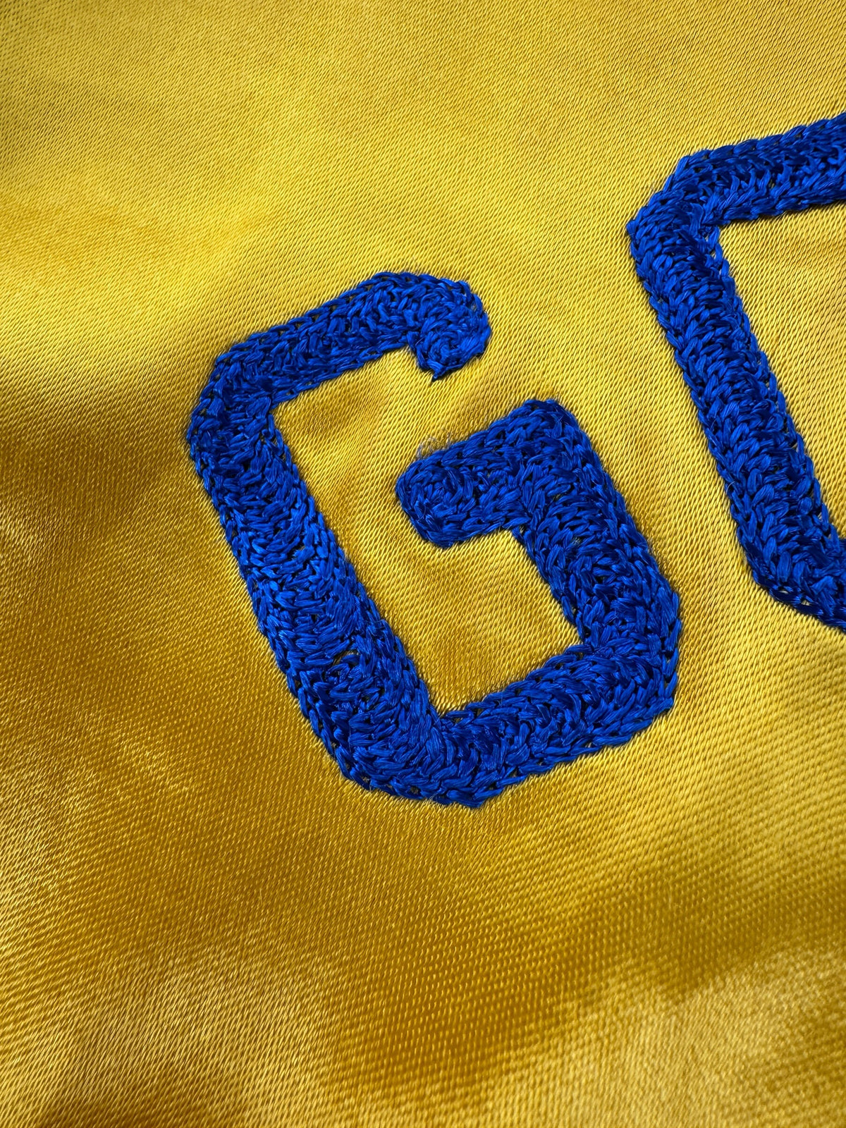 Close-up of chainstitch on Vintage 40s Goodyear Tires Satin Jacket SZ 42