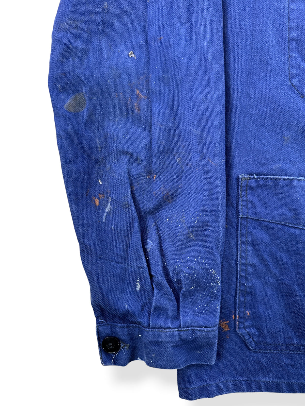 Paint on sleeve of Vintage Paint Splattered French Chore Coat SZ M