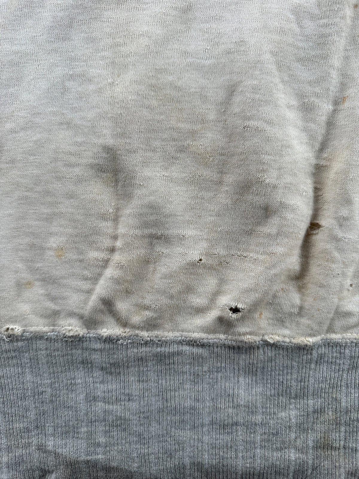 Holes near bottom hem on front of Vintage Thrashed 1940s Quarterzip Sweatshirt SZ L