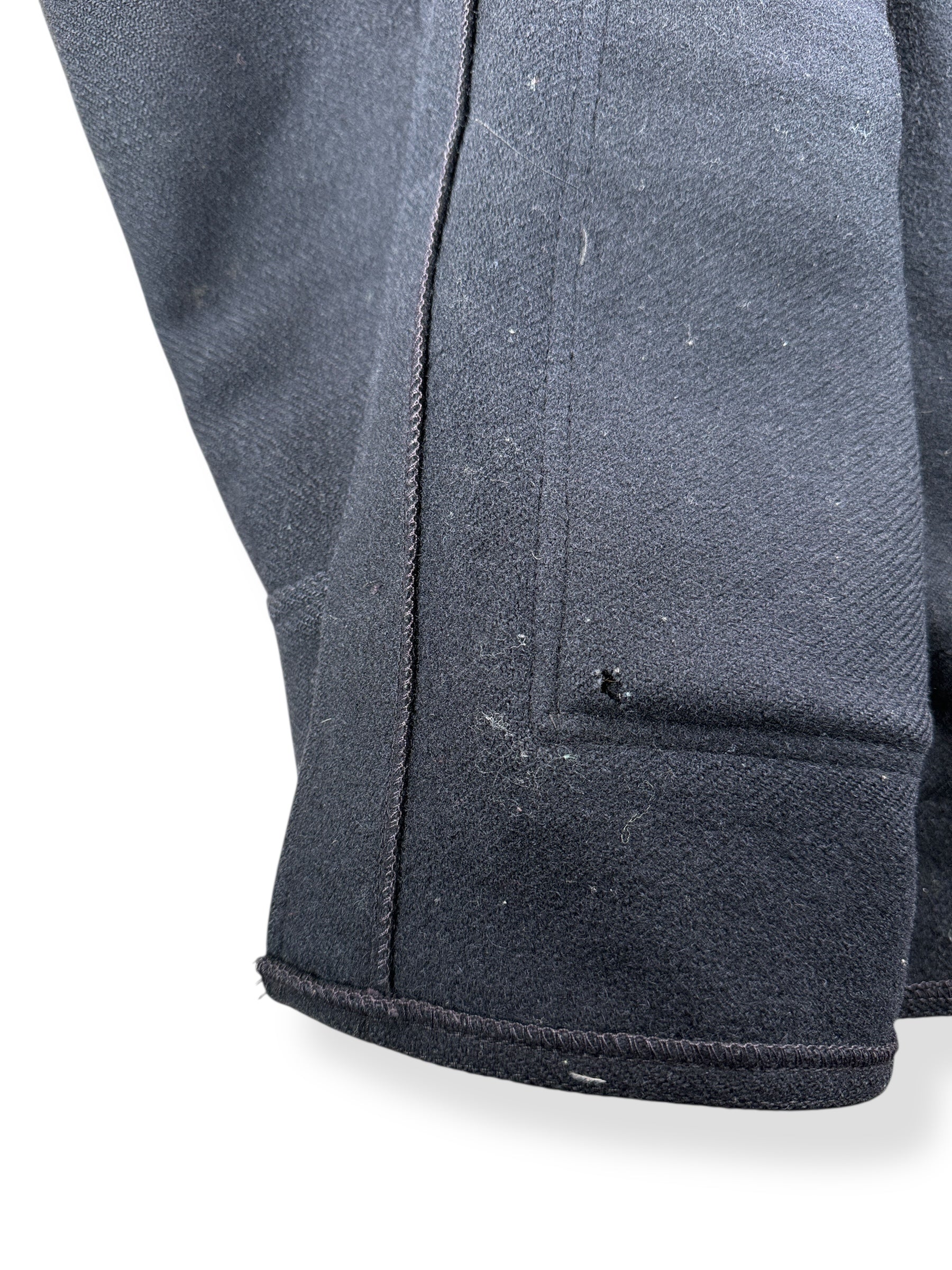 Moth Nibble on Vintage Black Filson Cruiser Jacket SZ 44