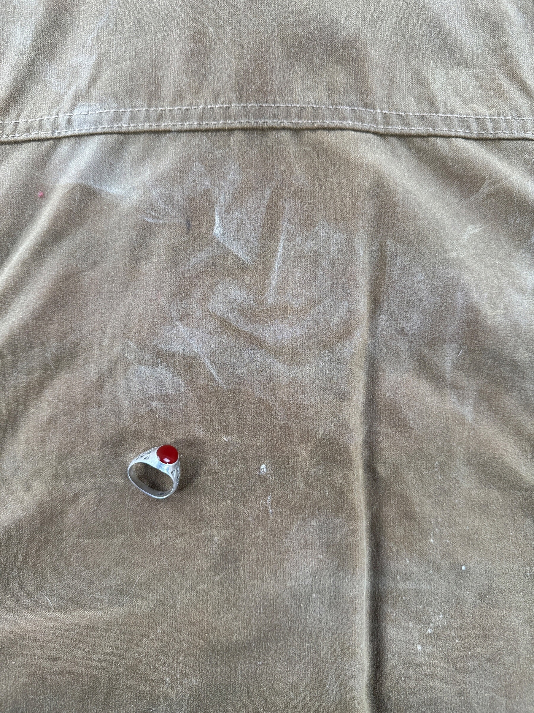 Discoloration on back of Filson Tin Cloth Hunting Vest SZ M