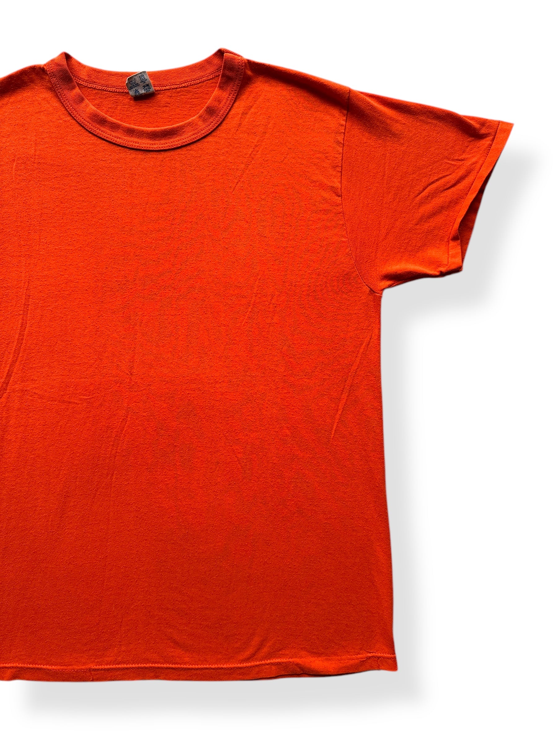 Front Left of Vintage Champion Blue Bar Orange Blank Tee SZ XL