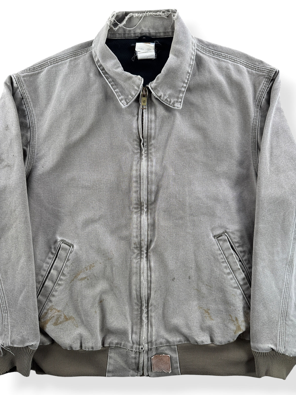 Close-up of Vintage Distressed Carhartt Work Jacket SZ XL