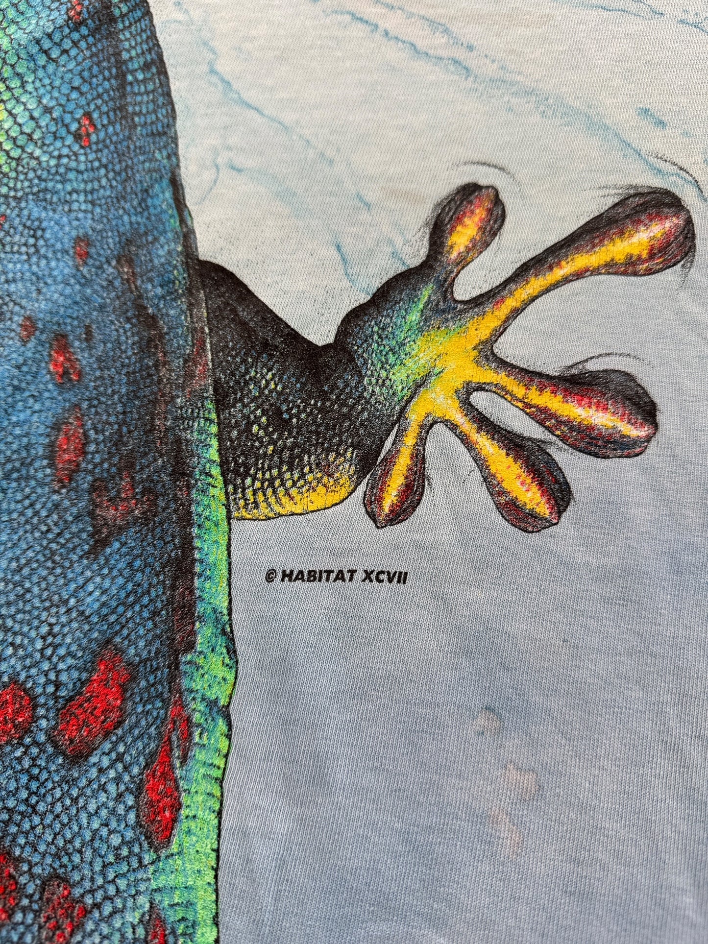Copyright on back graphic of Vintage AOP Rainforest Cafe Lizard Tee L - AS IS