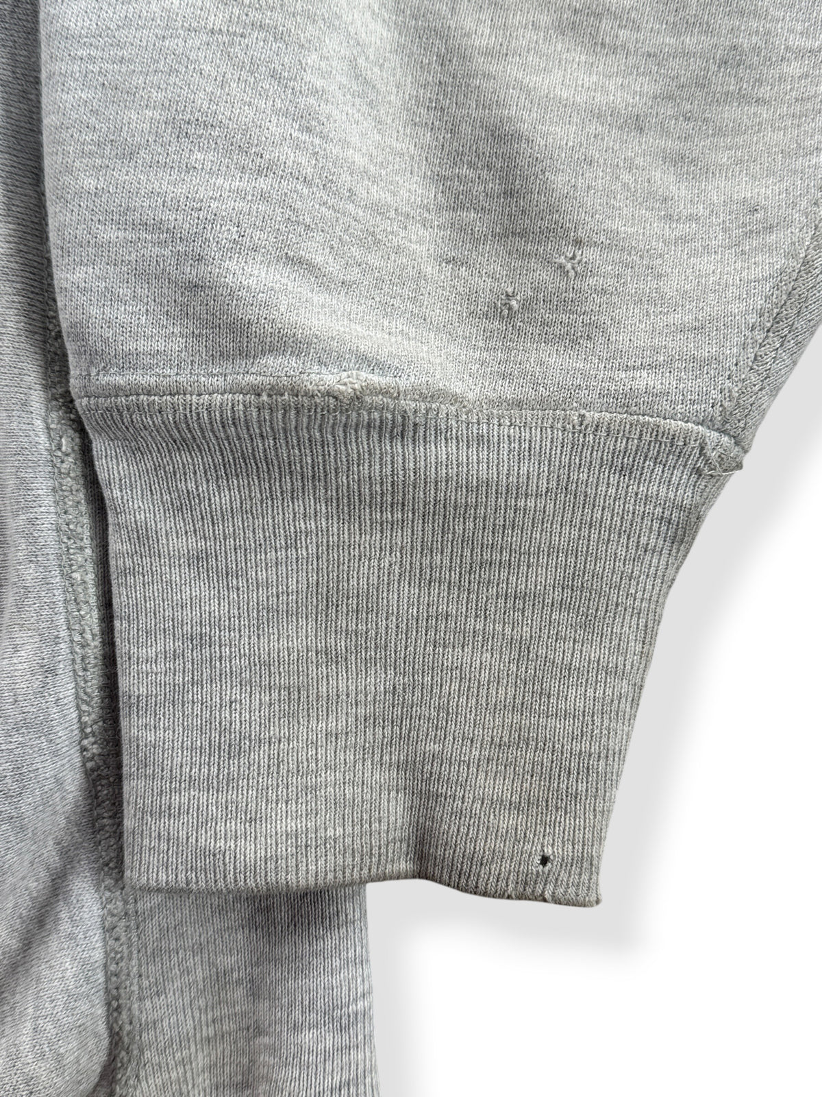 Ware on cuff of Vintage Colgate Champion Reverse Weave Crewneck SZ XL (Fits L)