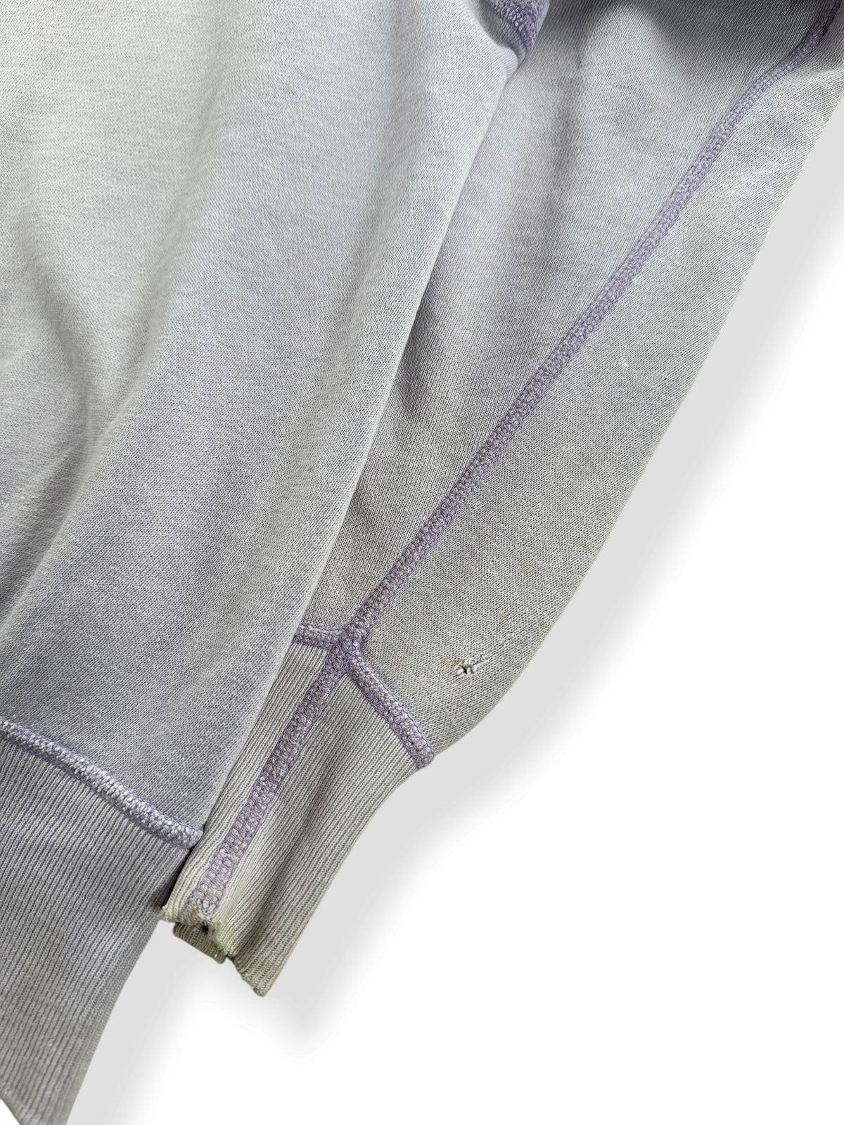 Hole on cuff of Vintage Lilac All Cotton Crewneck SZ L