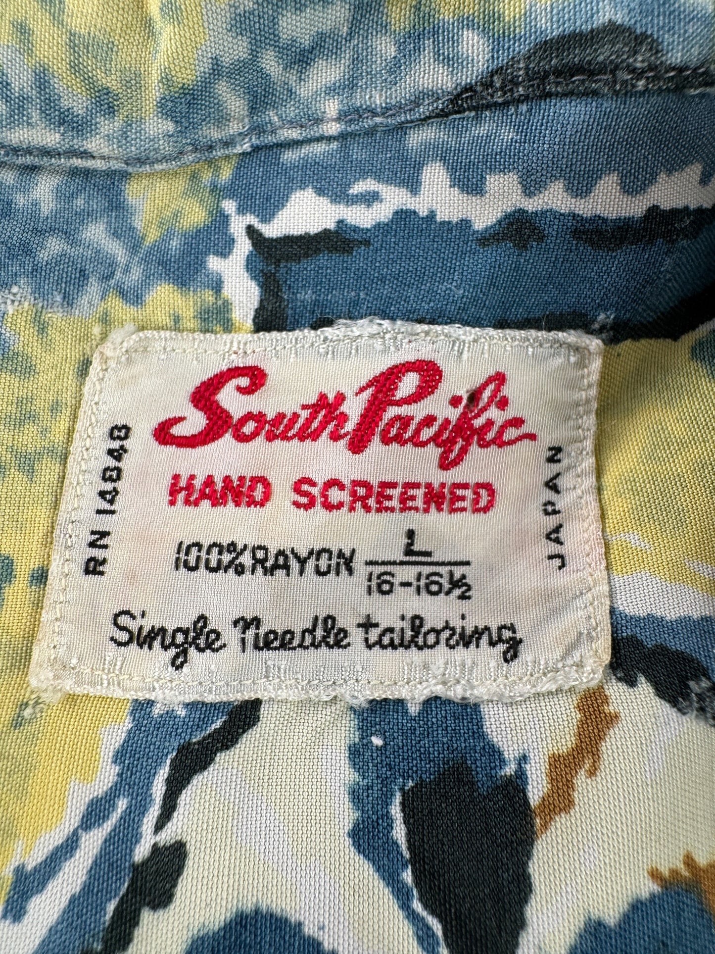Tag on Vintage South Pacific Rayon Thrasher Aloha Shirt SZ L