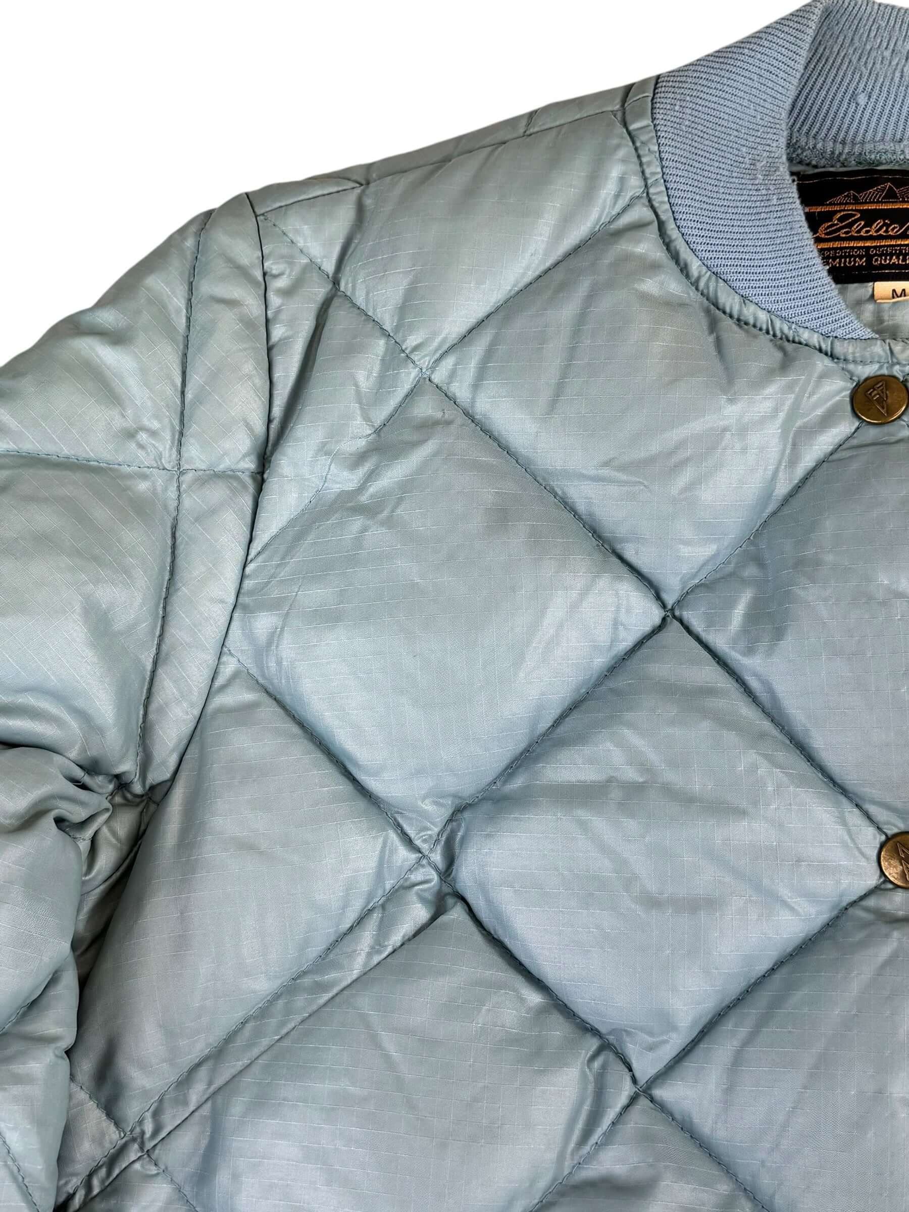 Right shoulder view of 80s Eddie Bauer Pale Blue Quilted Puffer Jacket M