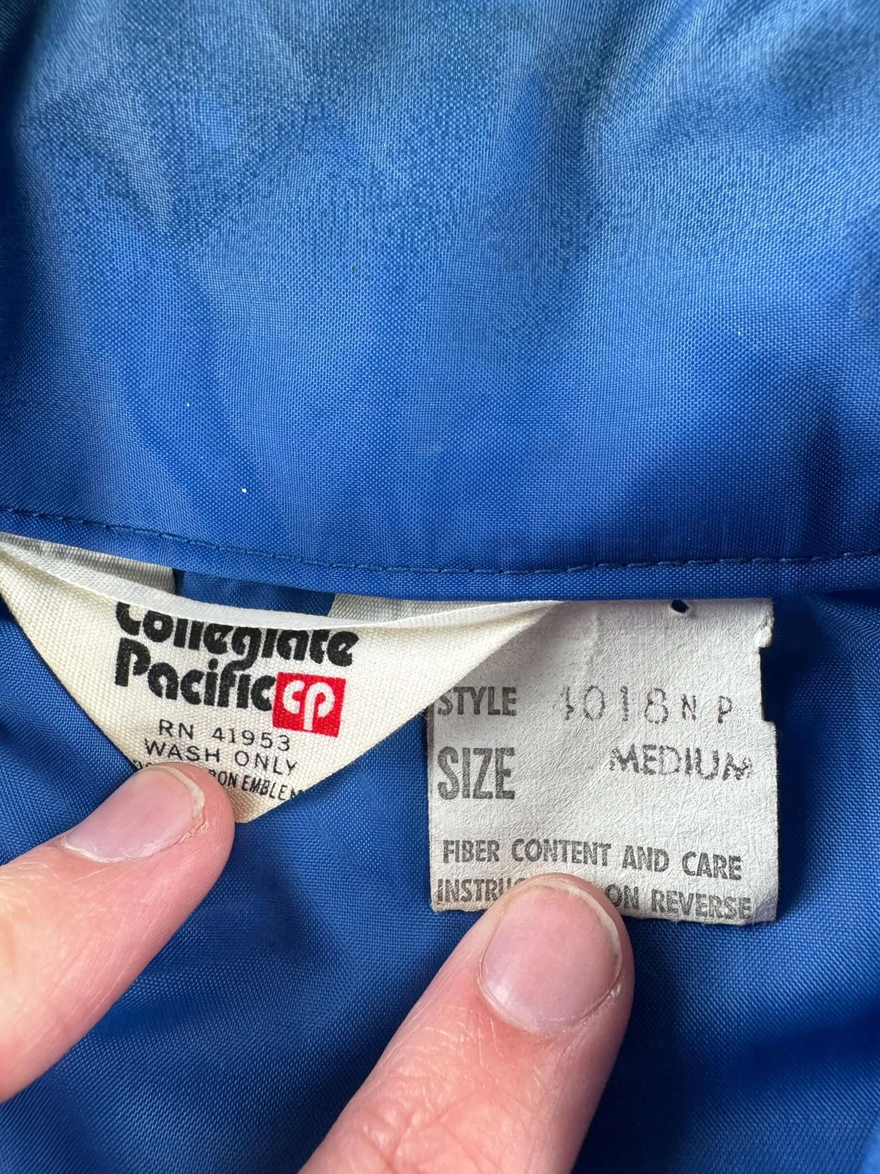 Tag on Vintage Collegiate Pacific Olympia Beer Windbreaker SZ M