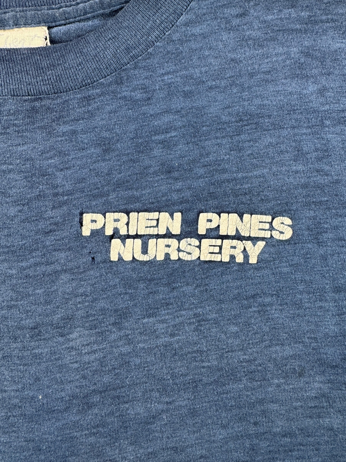 Front graphic on Vintage Faded Prien Pines Nursery Tee SZ L