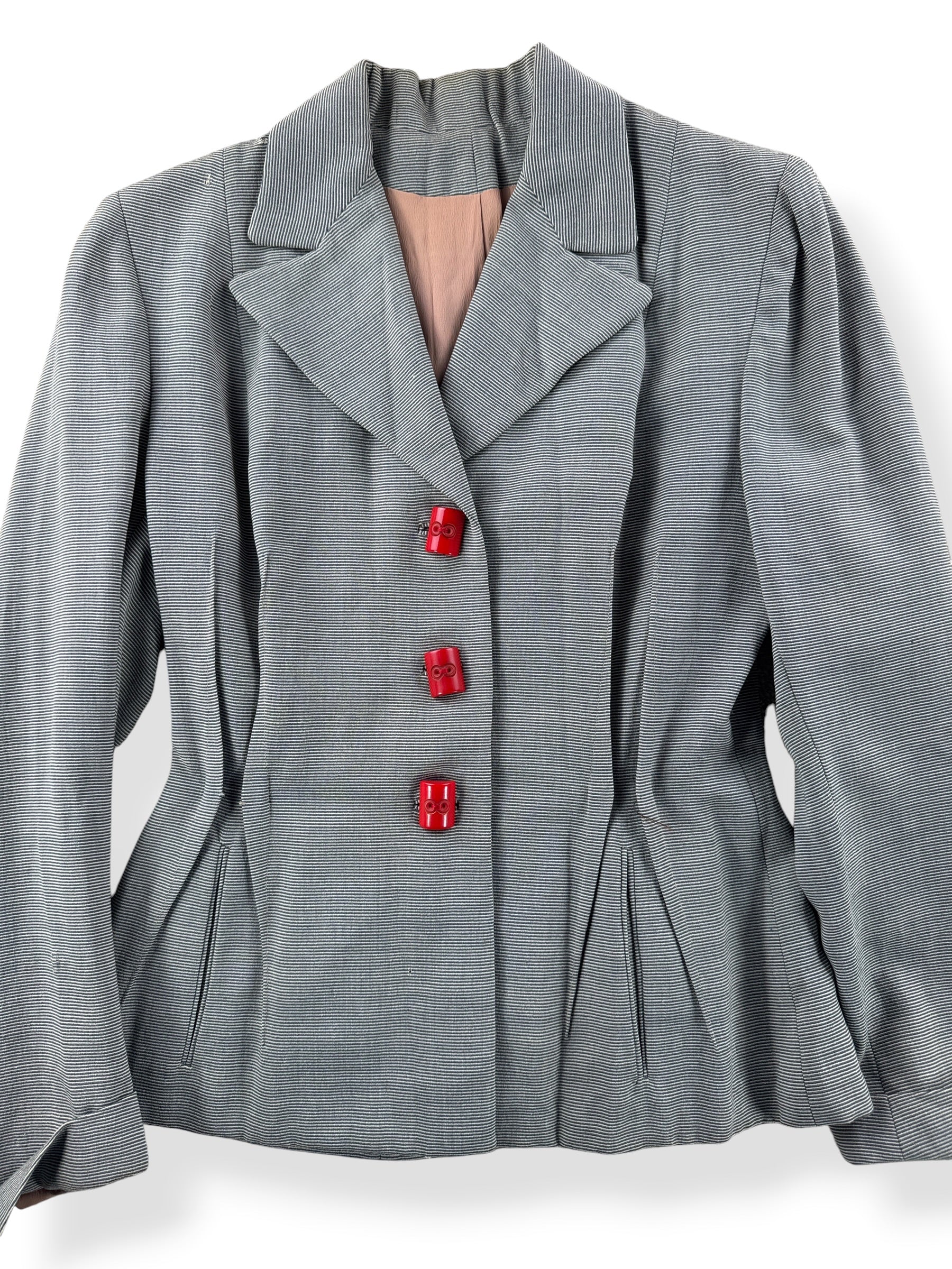 Close-up of Vintage Red Bakelite Button Blazer SZ S - AS IS