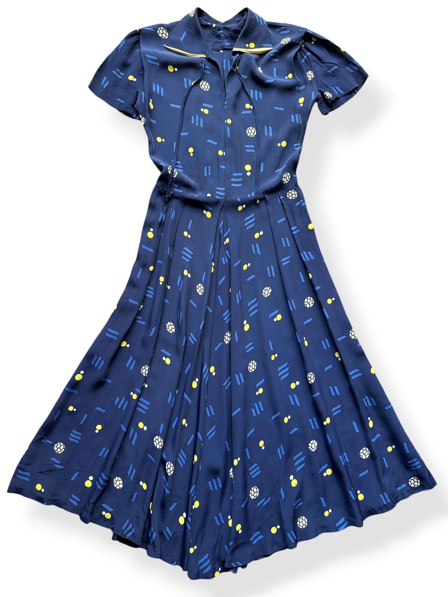 Close up of Vintage 1940s Rayon Geo Print Dress 