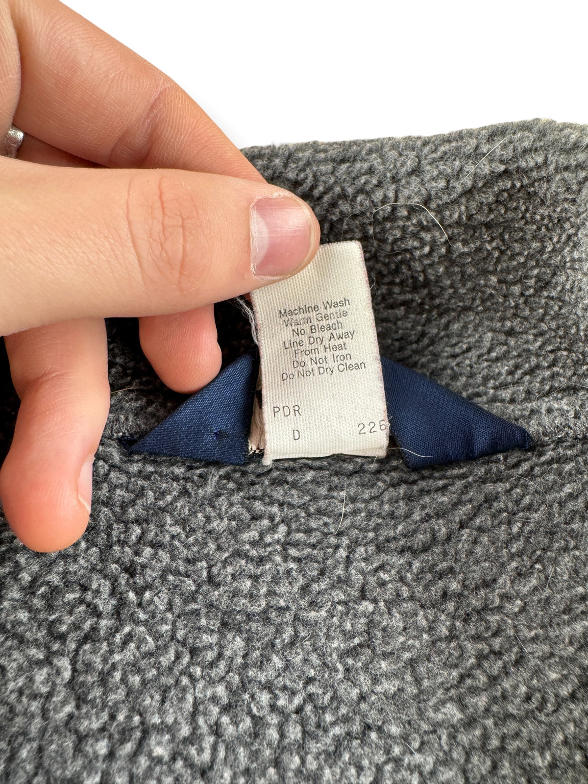 Back of info tag on Vintage Woolrich Grey Zip Up Fleece SZ L