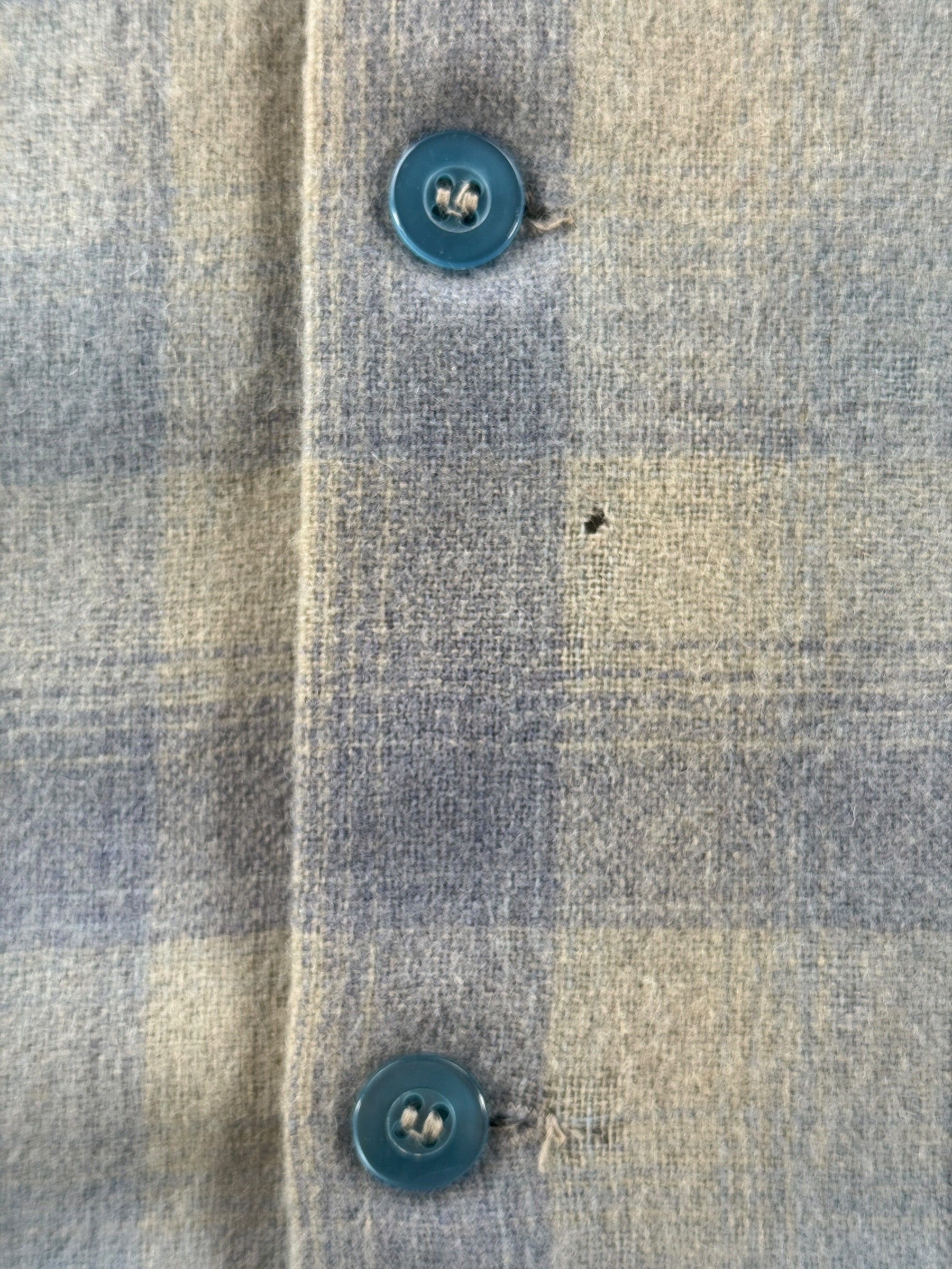 Small holes on Vintage Highlander Woolen Mills Blue Plaid Flannel SZ L - AS IS